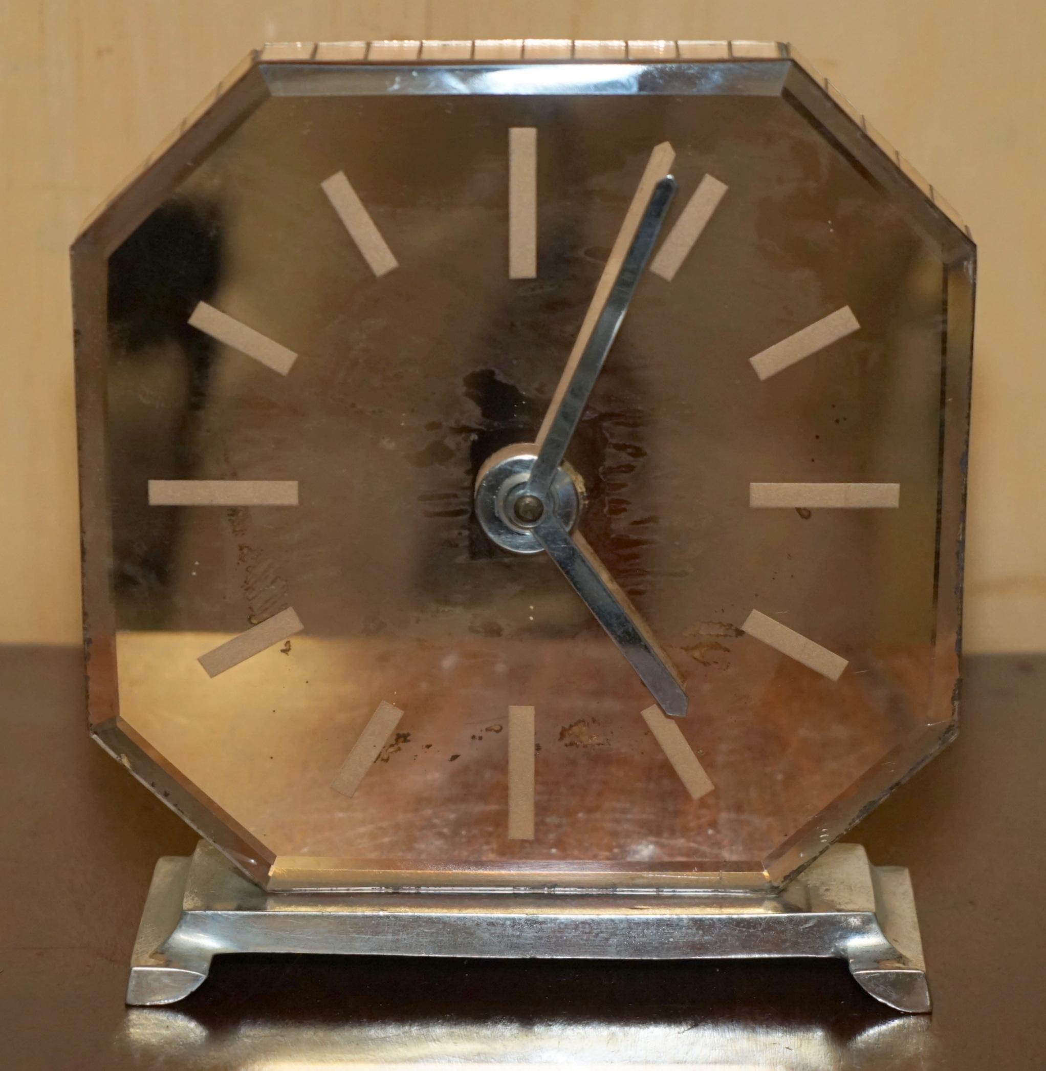 We are delighted to offer for sale this absolutely exquisite, totally original, Art Deco Salmon Pink glass mantle clock period foxing 

A very good looking and super rare mantle clock, I have never seen another like it and with the same foxing to