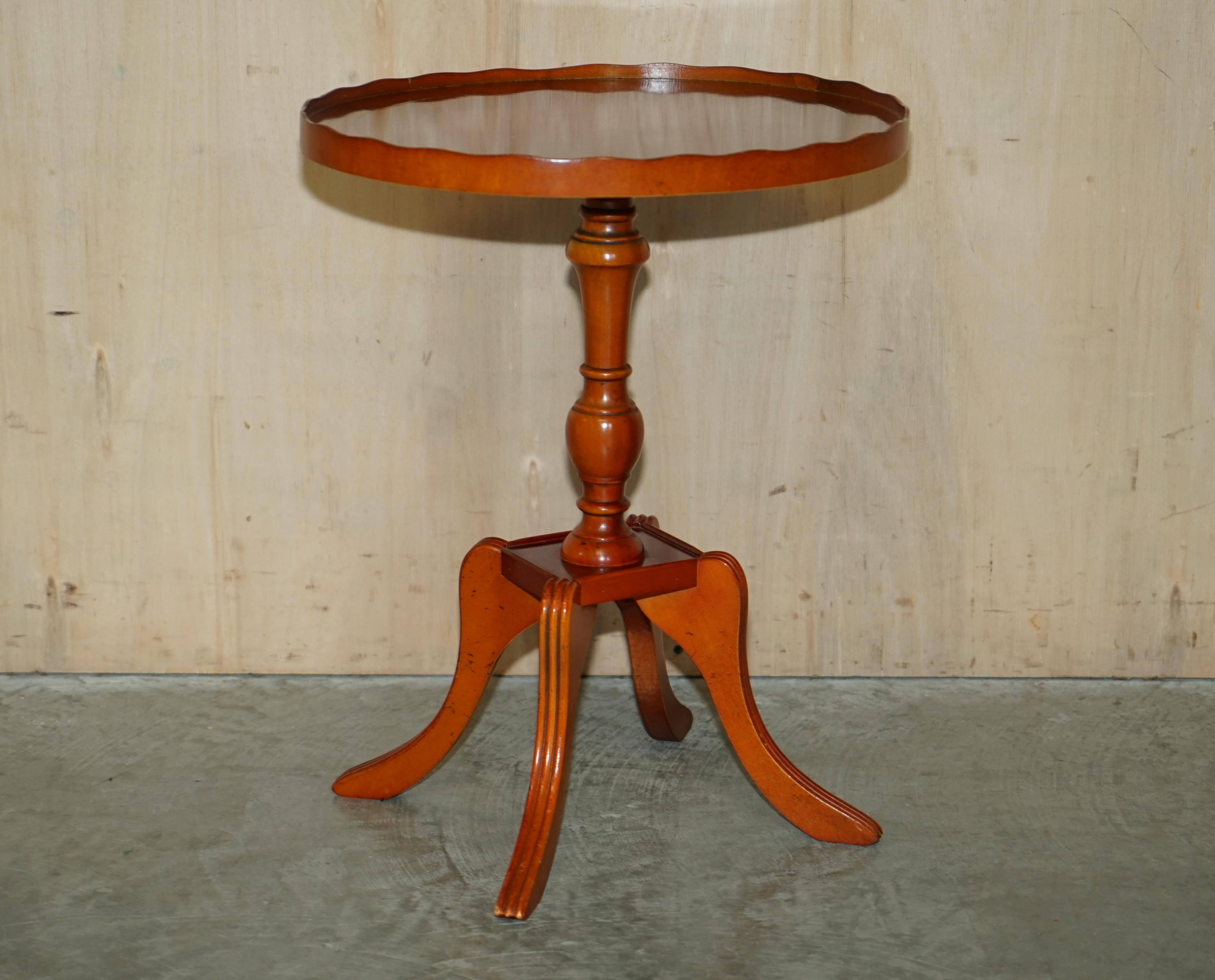 We are delighted to offer for sale this lovely hand made in England vintage Beresford & Hicks Burr Yew wood side table.

This piece is in sublime condition, the timber patina is exquisite, it has an oval top with a timber gallery rail like a