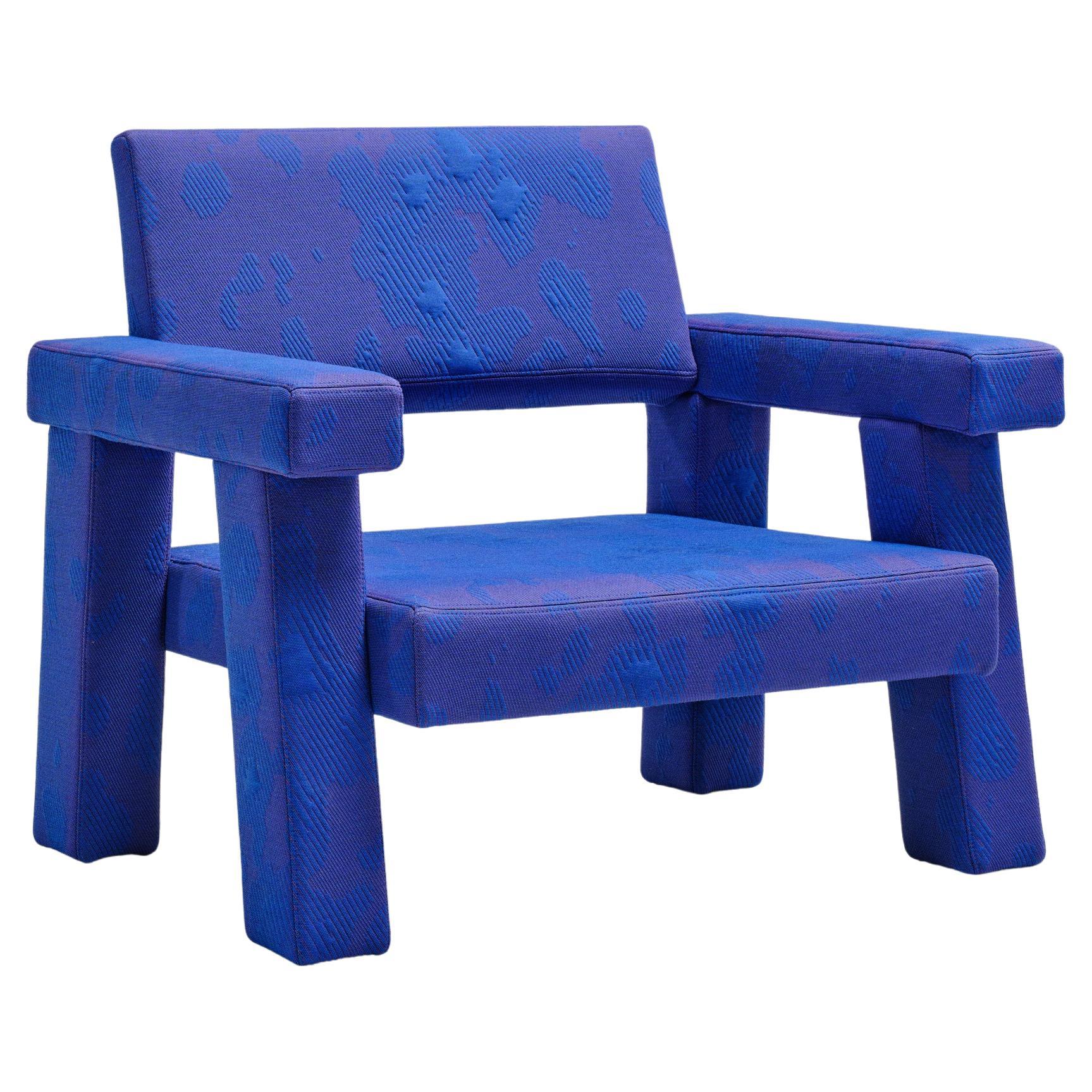Sillón de diseño coleccionable Mohs de Bogaerts en tejido exclusivo azul Byborre