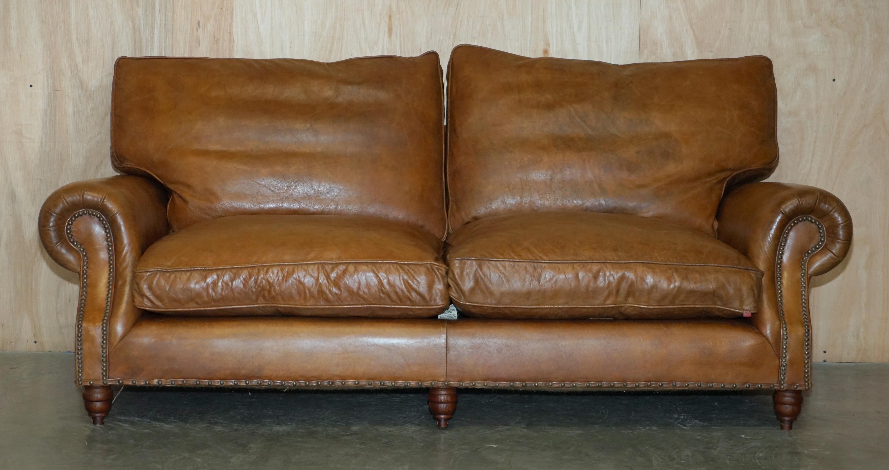 Royal House Antiques

Royal House Antiques is delighted to offer for sale this super comfortable, Timothy Oulton Balmoral, over sized Heritage brown leather sofa with two feather filled over stuffed cushions 

Please note the delivery fee listed is