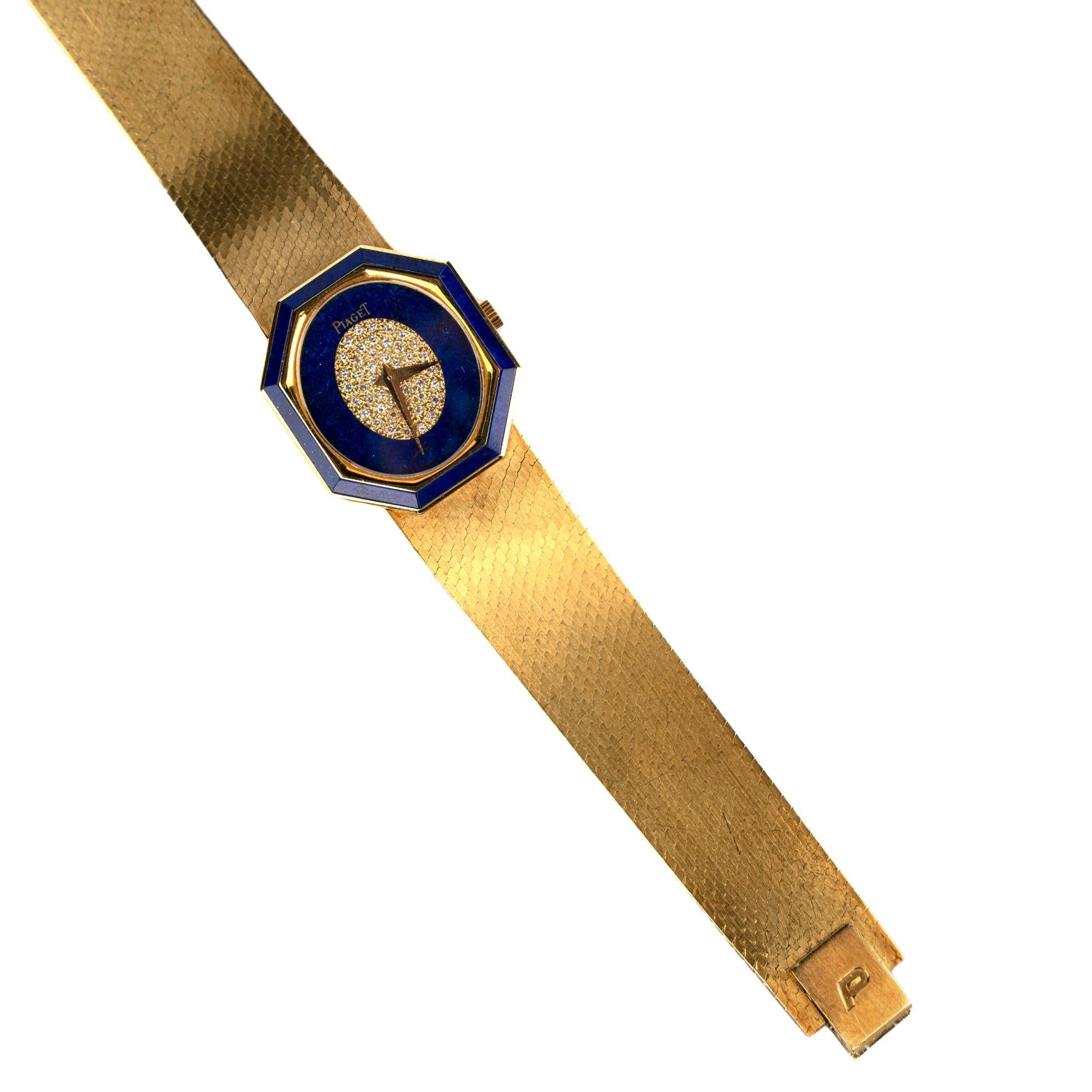 A collectible Piaget Lapis Lazuli Wrist Watch of Geometrical Design, accented by pavé diamonds on the dial and crafted in 18k yellow gold.

Made in Switzerland, circa 1970.