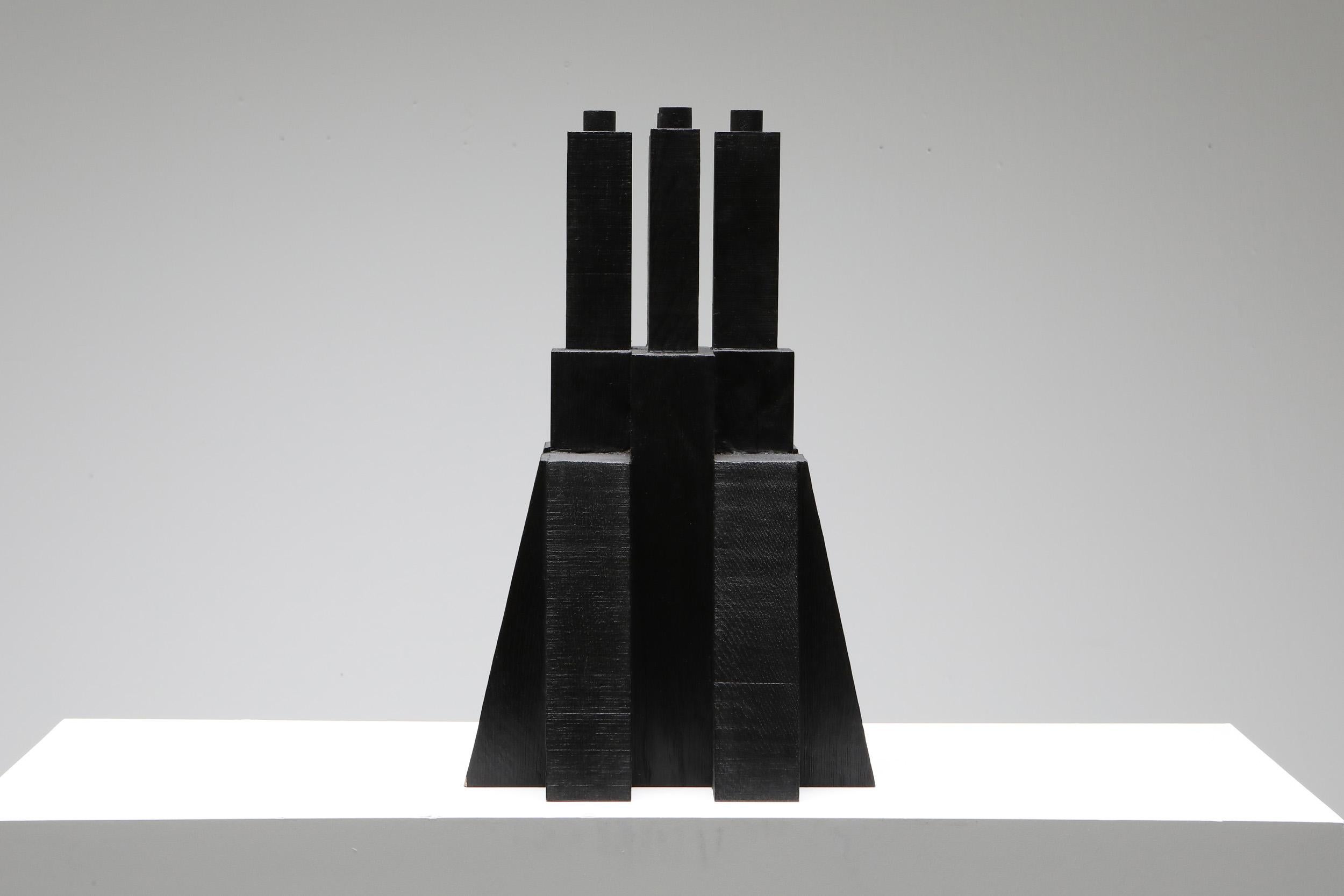 Brutalist, black, burnished, bunker candleholder, Arno Declercq, 2020; Collectible design; Handcrafted

Made in burned and waxed Oak
Measures: 32 cm wide x 32 cm long x 50 cm high / 12.6” wide x 12.6” long x 20” high
Fits well in an African
