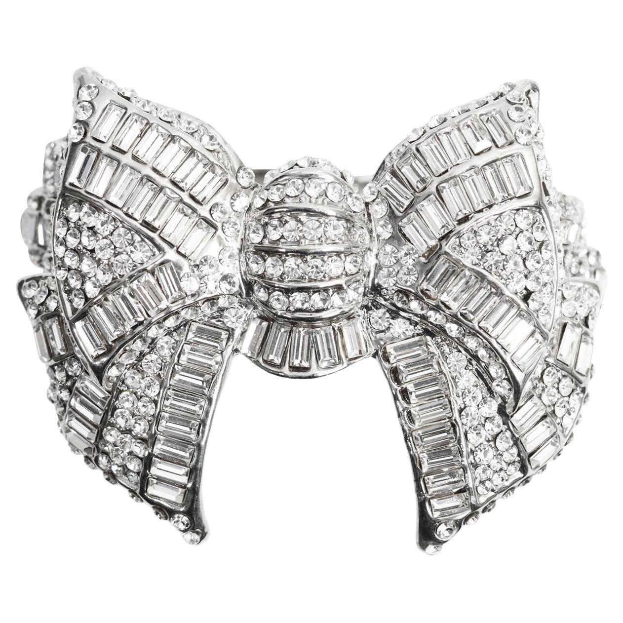 Collectible Butler and Wilson Crystal Bow Bracelet.  Clamps Shut on an internal Clamper as Seen on Photos.  7