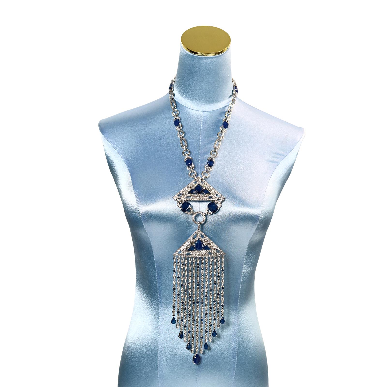 Vintage Carlo Zini Diamante and Blue Cabochon Dangling Necklace Sautoir Circa 2000s. This is one of those Pieces for when you go out or want to stand out.  The photograph doesn't capture the gorgeousness of this piece!!!

The necklace portion is 22