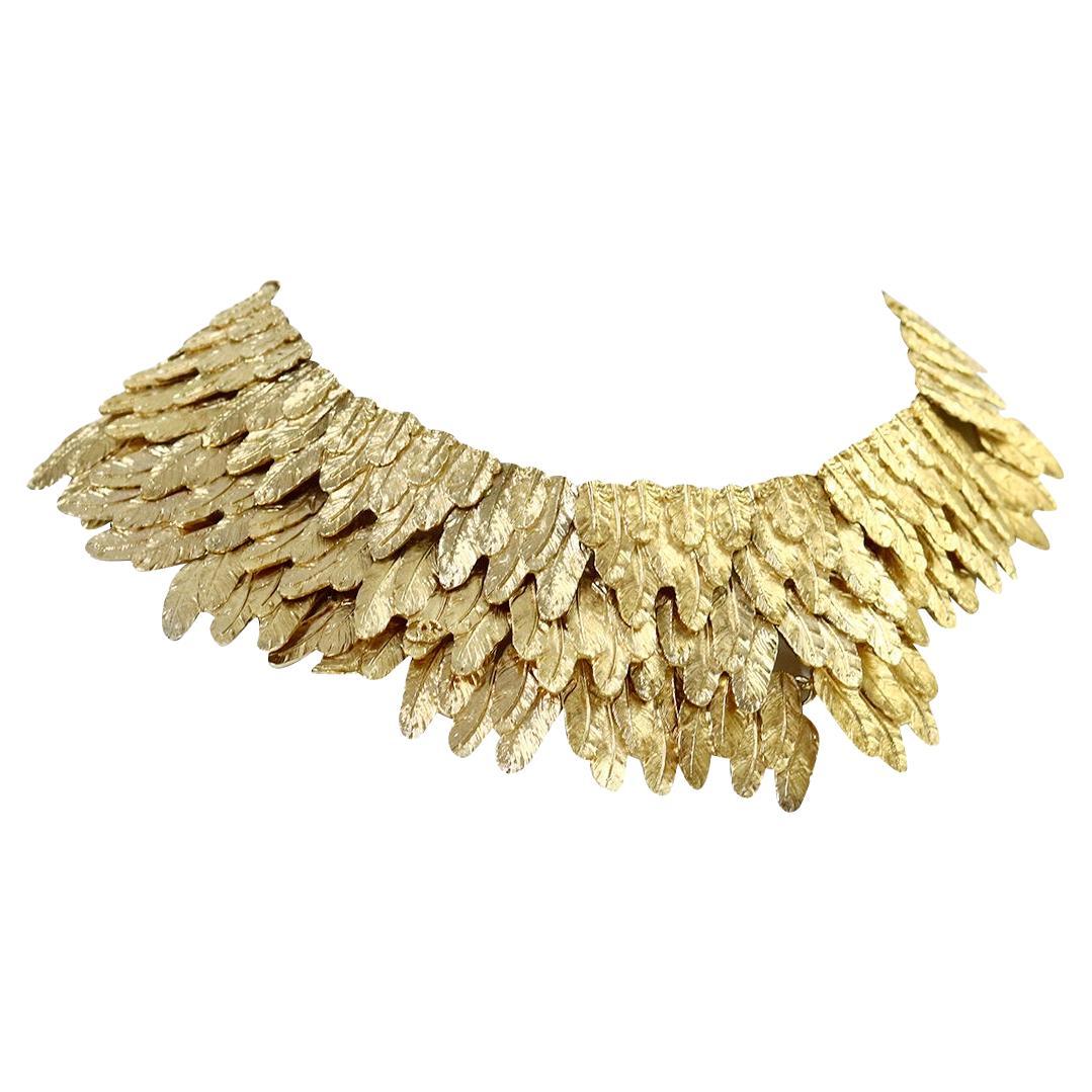 Collectible Chanel Gold Choker Necklace with Pieces of Wheat making up the Necklace.  It is  Made Purposely Uneven with one Side being Longer than the other.  It is 14-16