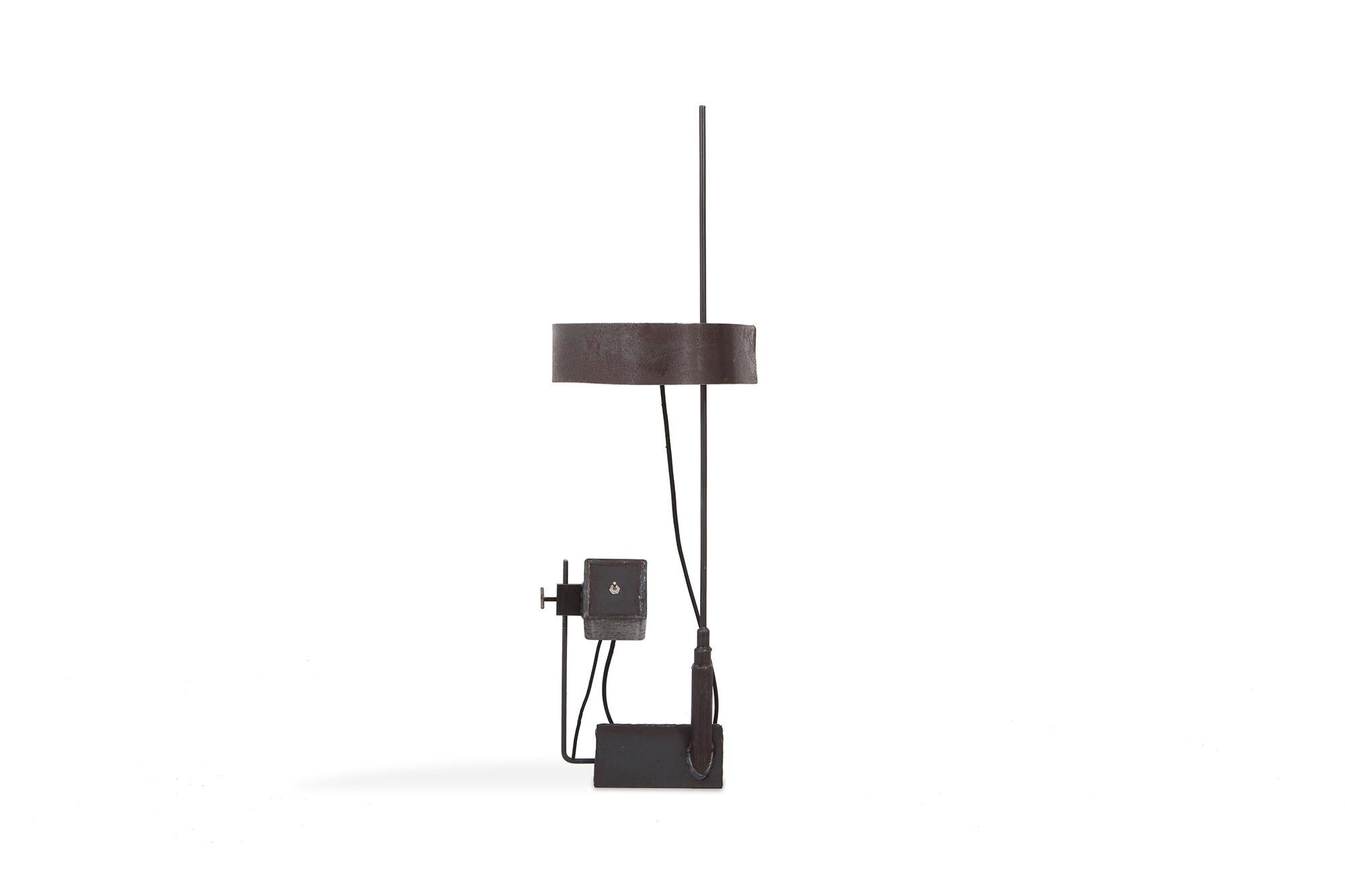 Brutalist table/floor lamp by Atelier Serruys, made in Belgium, 2018. 

This one-of-a-kind piece is adjustable and part of the Critique oblique collection - Number C0 04, which are all handcrafted. Playful Aesthetics that created a wonderful
