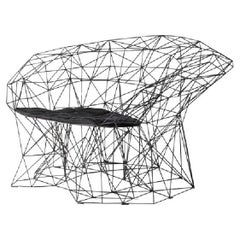 Collectional Fauteuil Design/One en barres d'acier élancées