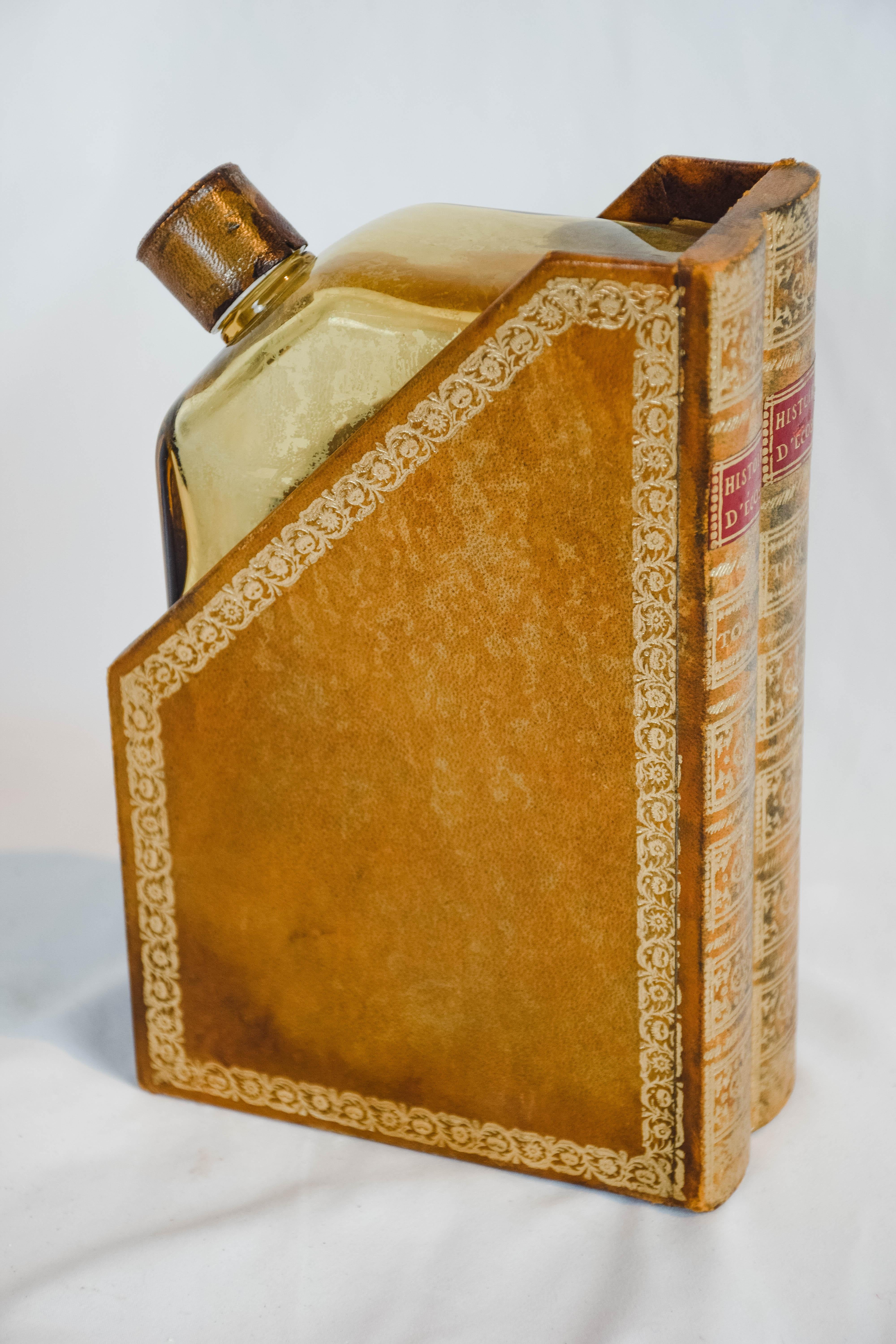 Collectible faux book with hidden flask. The tile written in French translates to 