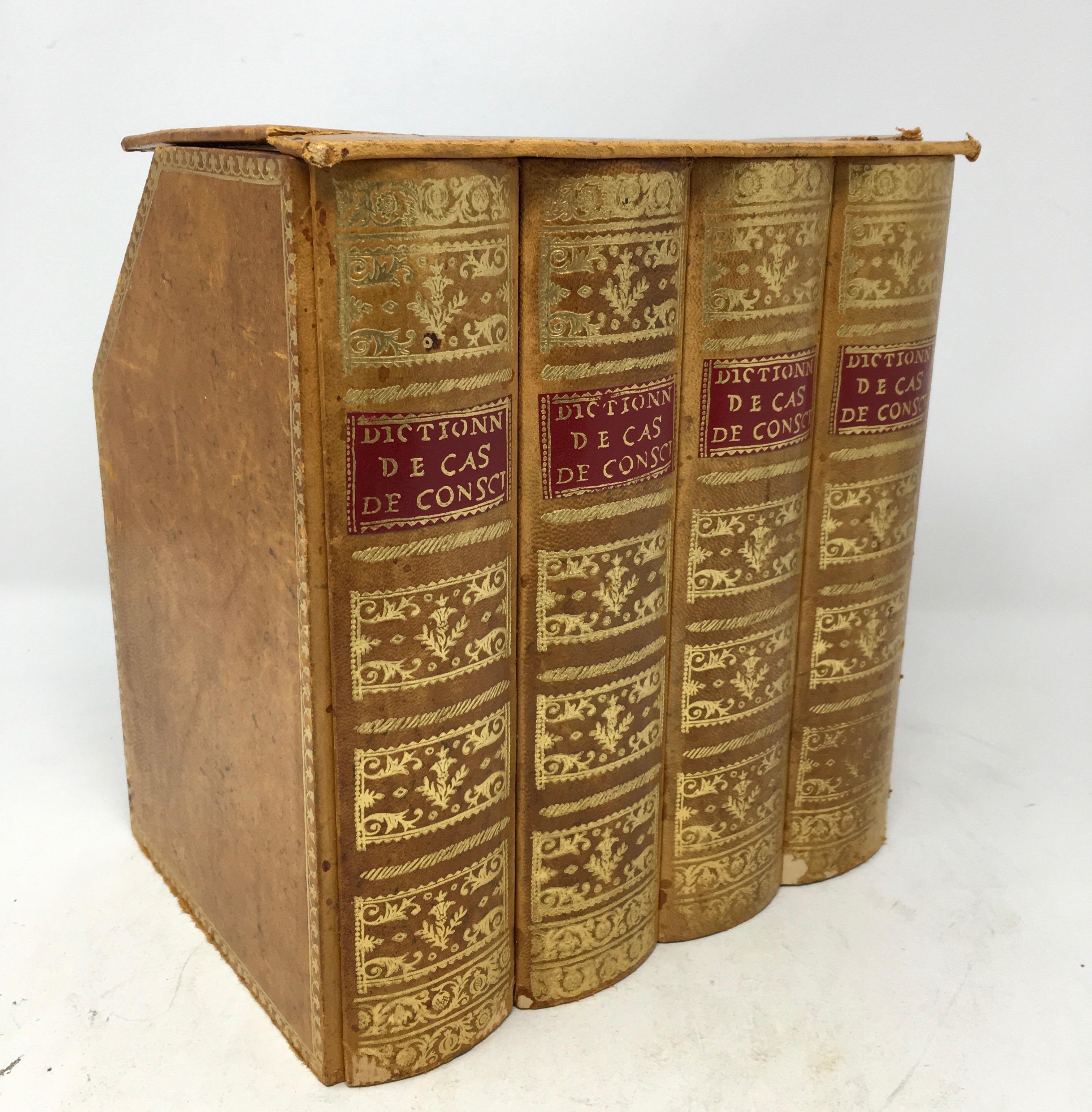 Collectible faux book with three hidden flasks. The faux book reveals three amber colored bottles typically used to conceal alcohol. Found in France this piece is a great conversation piece and a handsome decoration for your bar or tucked away in