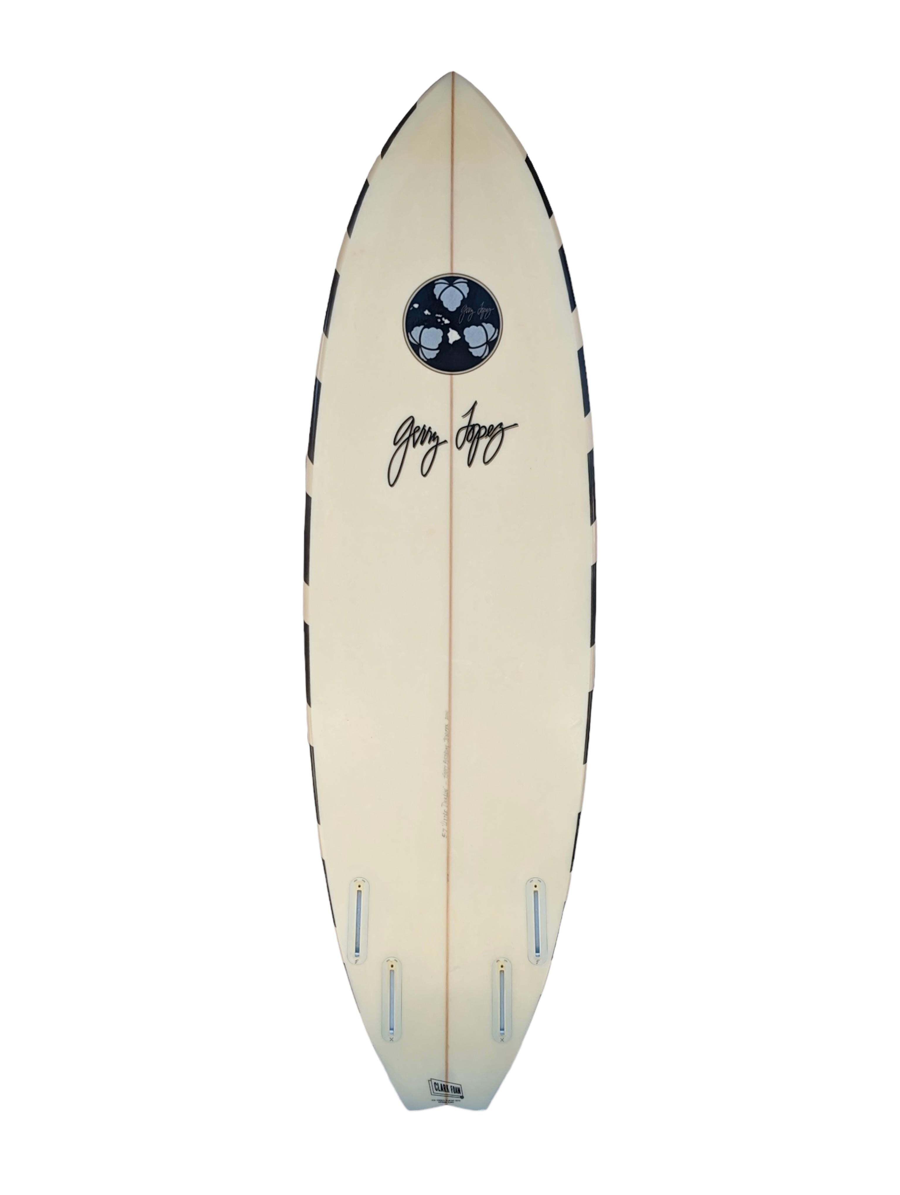 Collectible Gerry Lopez quad-fin surfboard. Featuring airbrushed tiger stripe design that Lopez boards were known for during the 1980s-1990s. Shape with a rare Clark Foam blank. A great example of the famous tiger striped Gerry Lopez surfboards!