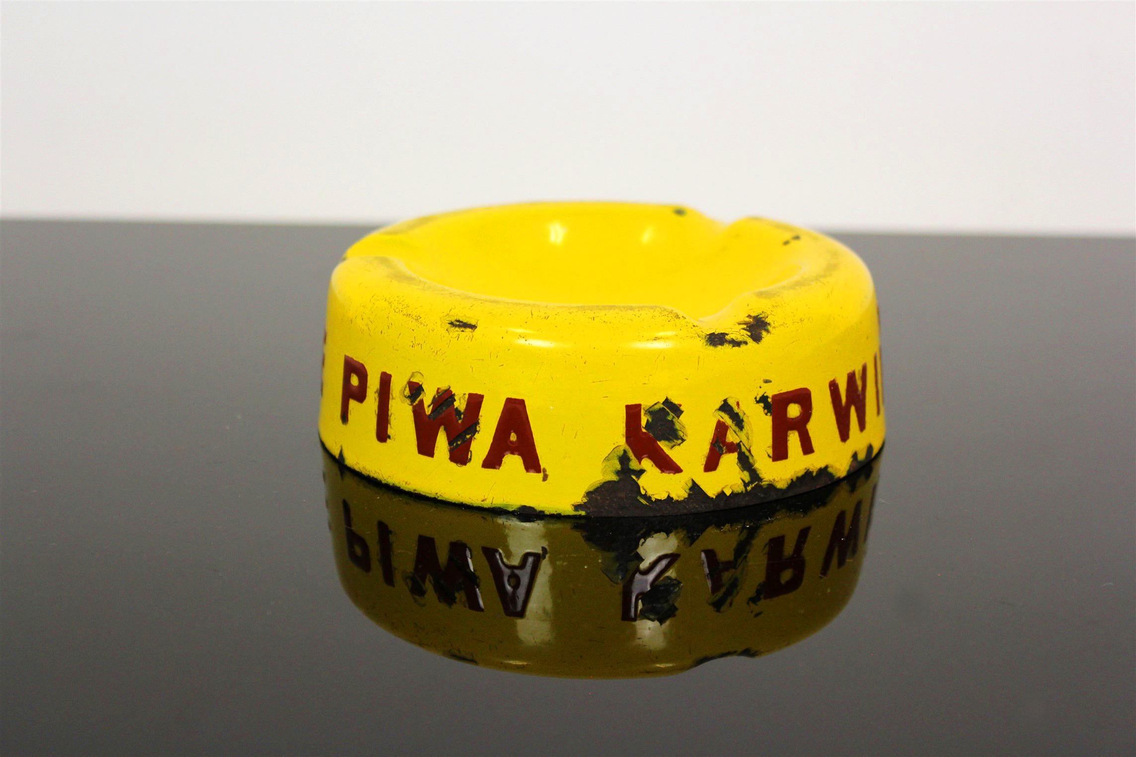 Collectible advertising enamel ashtray with the inscription in Polish 