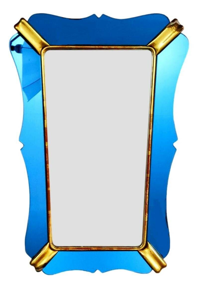Seltener Sammlerspiegel von Cristal Art, um 1940, im Stil von Gio Ponti

Holzstruktur, blaue Spiegel (... auf den Fotos erscheint es blau und hellblau, aber das liegt an den Reflexionen ...), goldene Holzecken

Er ist knapp 90 cm hoch, im oberen