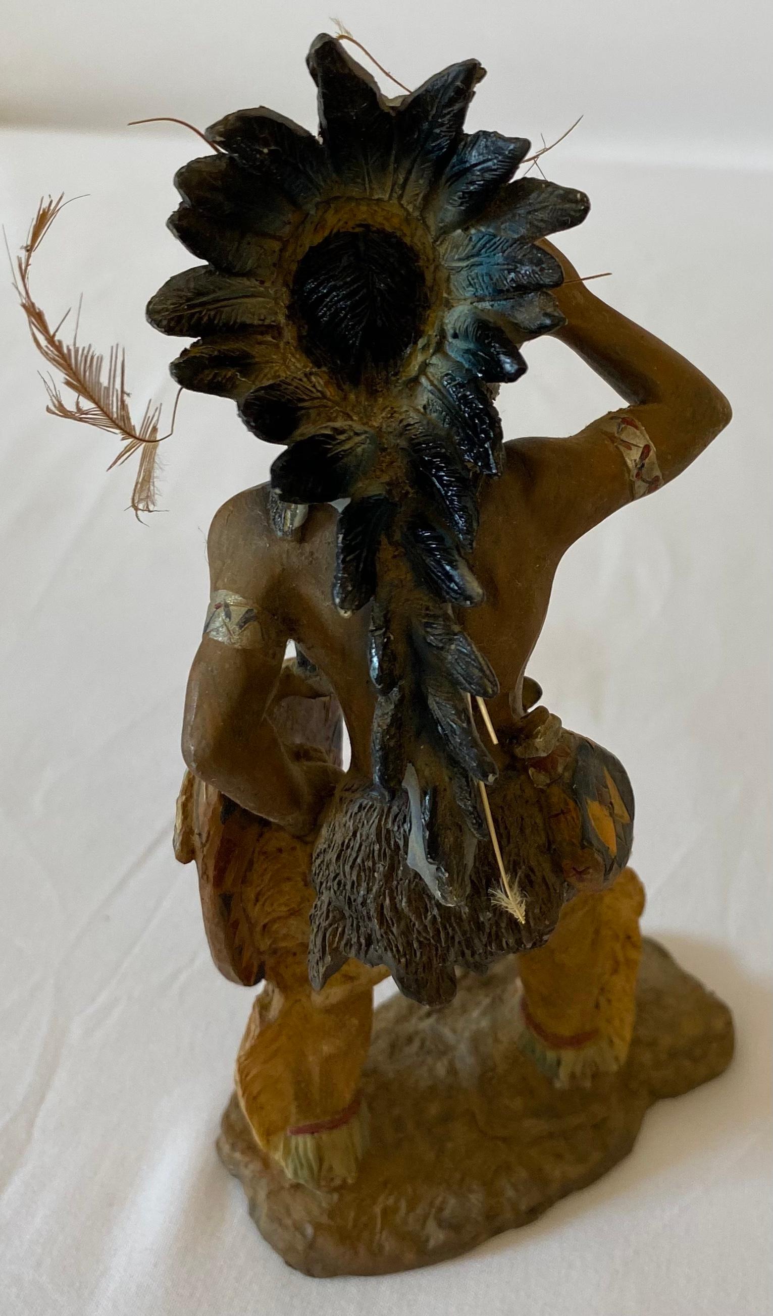 Artfully crafted and attributed to Universal Statuary Corp. this collectible Native American Indian statue will look great in any western setting or as an educational tool.

Although this items shows age appropriate wear, it has striking
