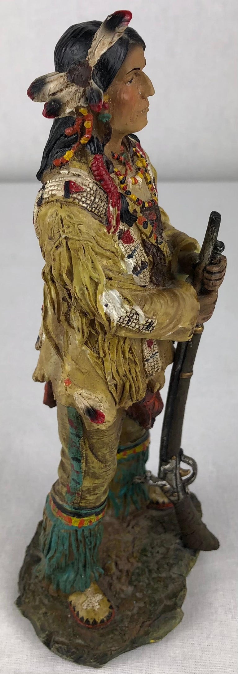 Collectible Native American Indian Hunter with Gun at 1stDibs