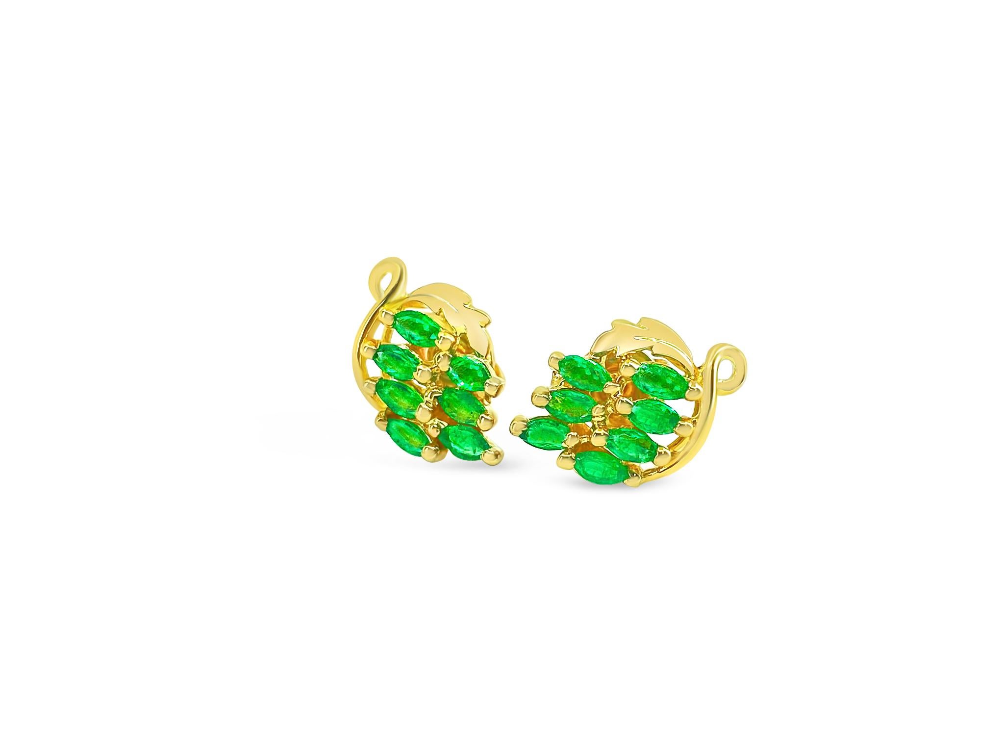 Fashioned from 14k yellow gold, these vintage stud earrings boast a total of 2.25 carats of marquise-shaped, natural earth-mined emeralds. Weighing 1.82 grams, these collectible earrings feature a timeless design and come with butterfly pushbacks