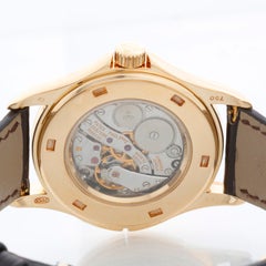 Collectible Patek Philippe Travel Time Men's 18k Yellow Gold Watch 5134-J or 513