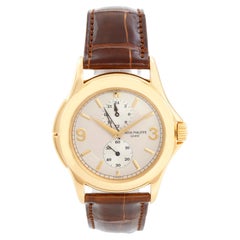 Collectible Patek Philippe Travel Time Men's 18k Yellow Gold Watch 5134-J or 513