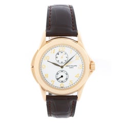 Collectional Patek Philippe Travel Time Montre pour homme en or jaune 18k 5134-J ou 513
