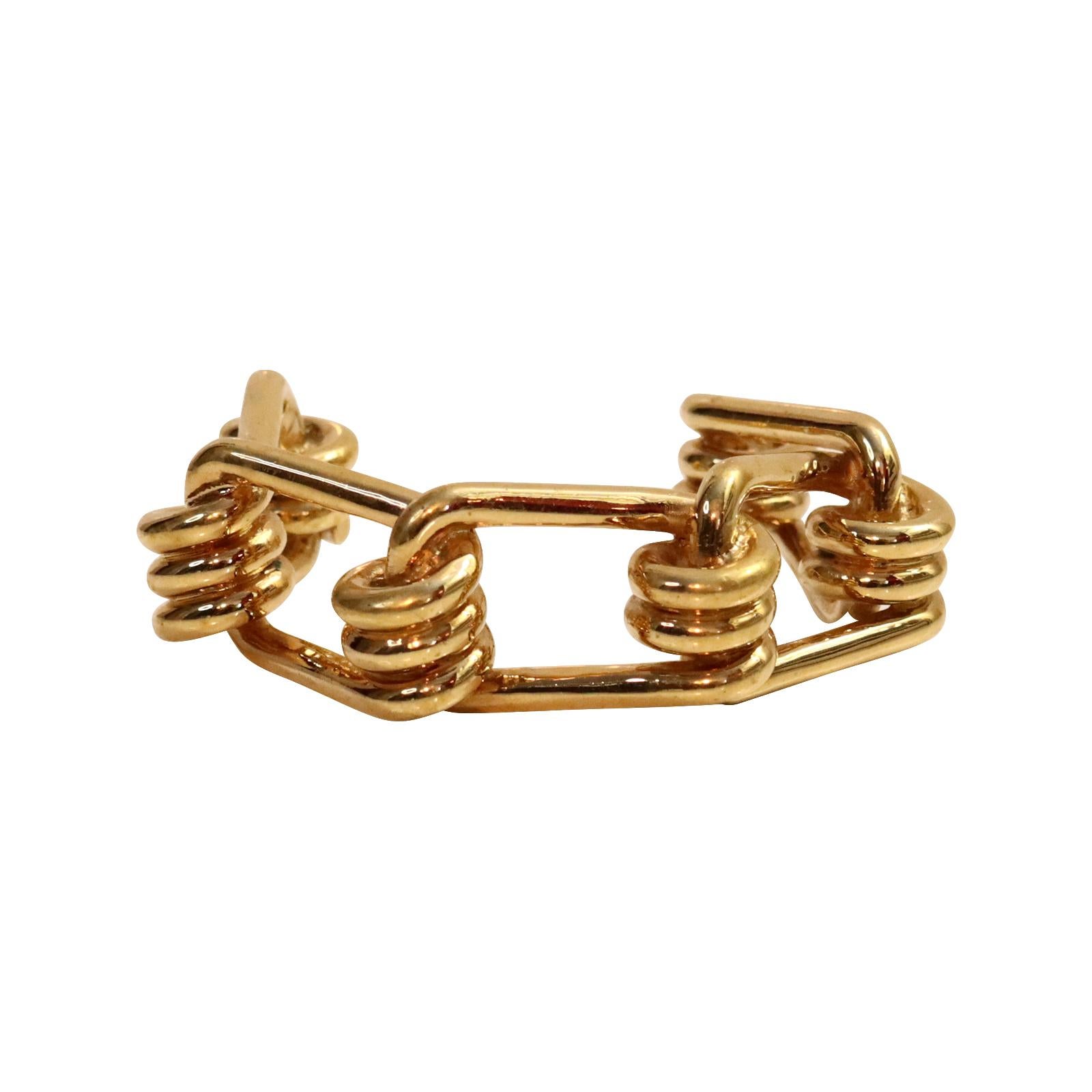 Collectible Reed Krakoff Gold Tone Knotted Cuff Bracelet Circa 2000's.  This bracelet is so substantial and well-made.  Reed Krakoff didn't produce a large quantity of jewelry during his tenure in business, but what he did create was unusual and