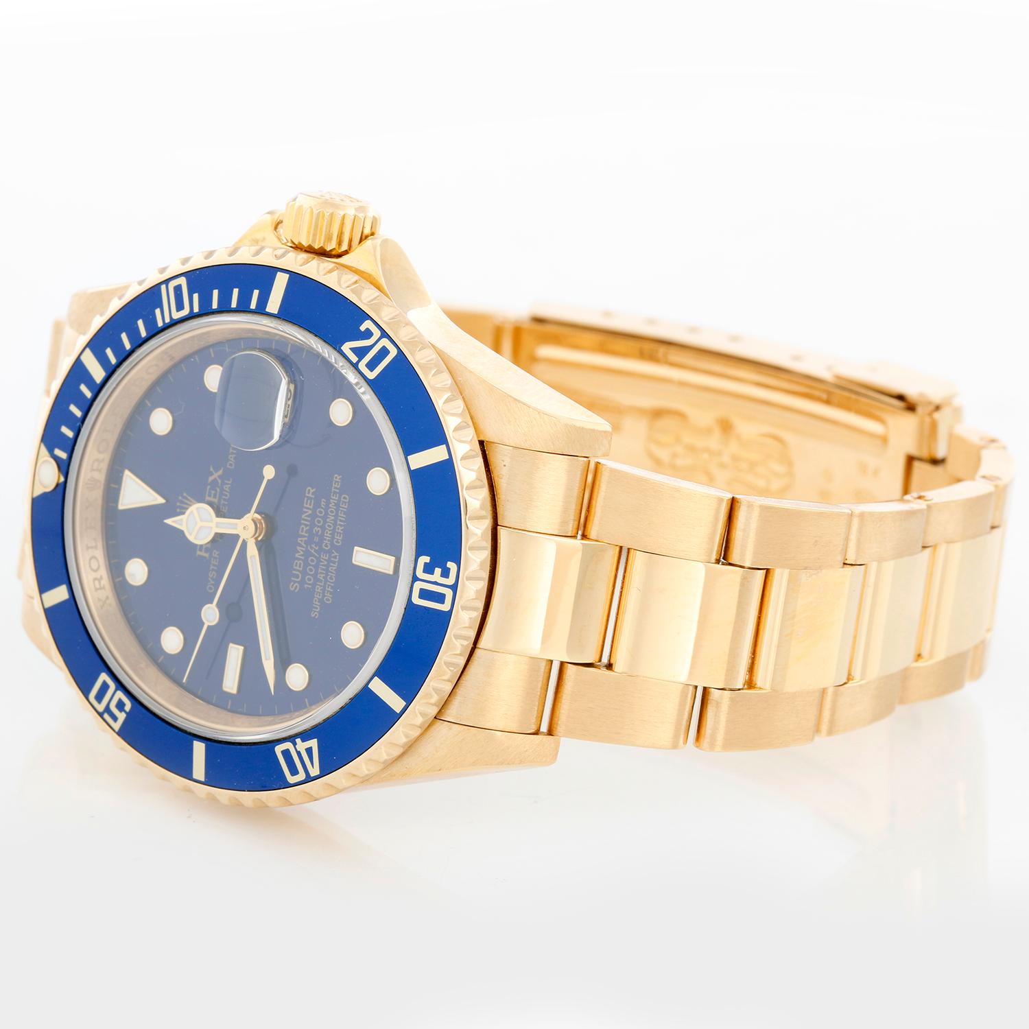 Collectible Rolex Submariner 18k Gold Men's Watch 16618 Blue Dial - Automatic winding, 31 jewels, Quickset, sapphire crystal. 18k yellow gold case with rotating bezel with blue insert (40mm diameter) Inner bezel engraving . Blue dial. 18k yellow