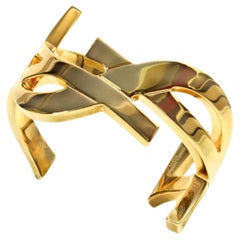 Collectible Saint Laurent YSL Gold Tone YSL Wrap Around Heavy Bracelet Cuff