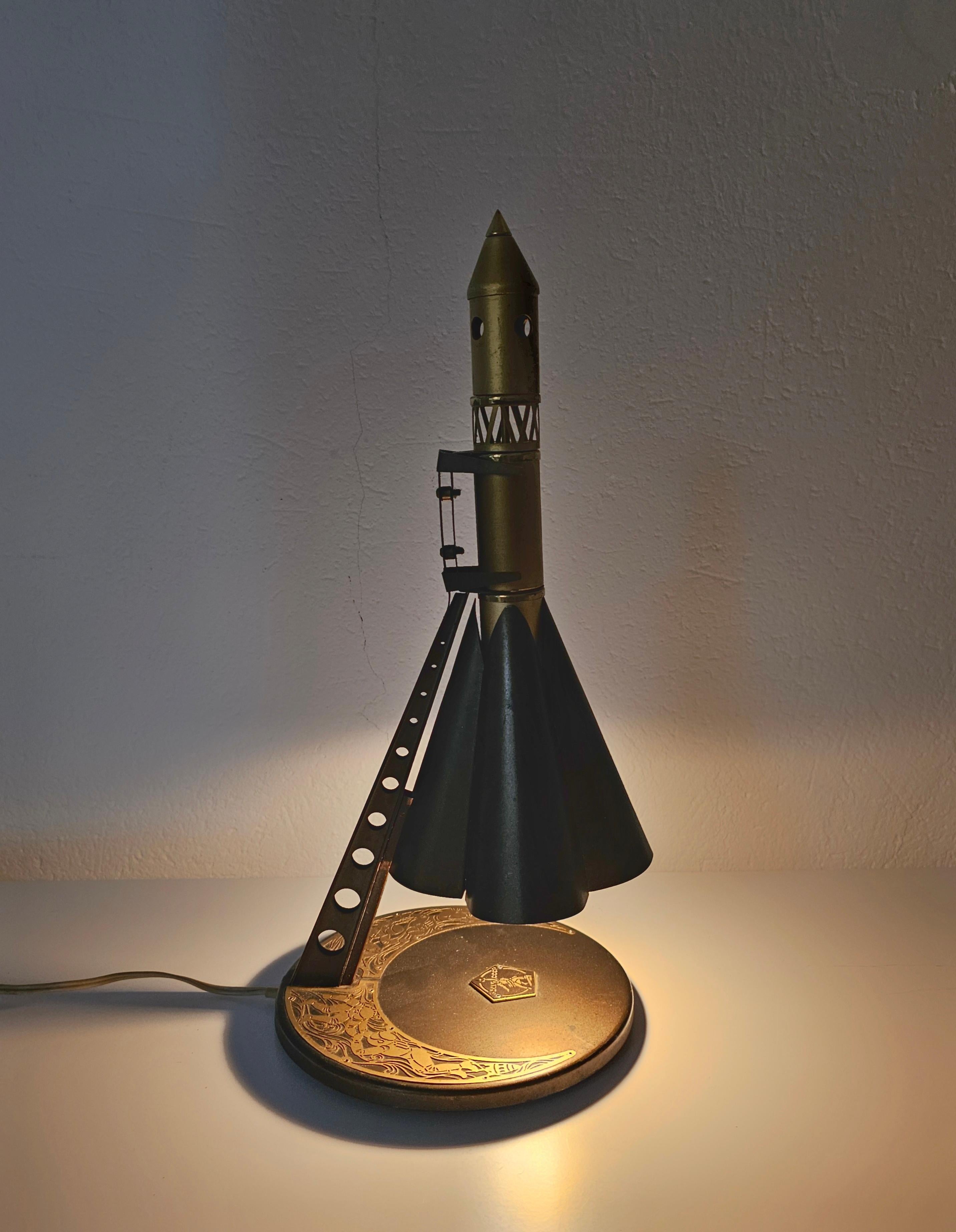 In this listing you will find an exceptionally rare, limited edition Soviet Union Souvenir desk lamp - START. The lamp is made of metal in the early 1960s, inspired and devoted to the first flight to space by Yuri Gagarin on VOSTOK rocket. 

The
