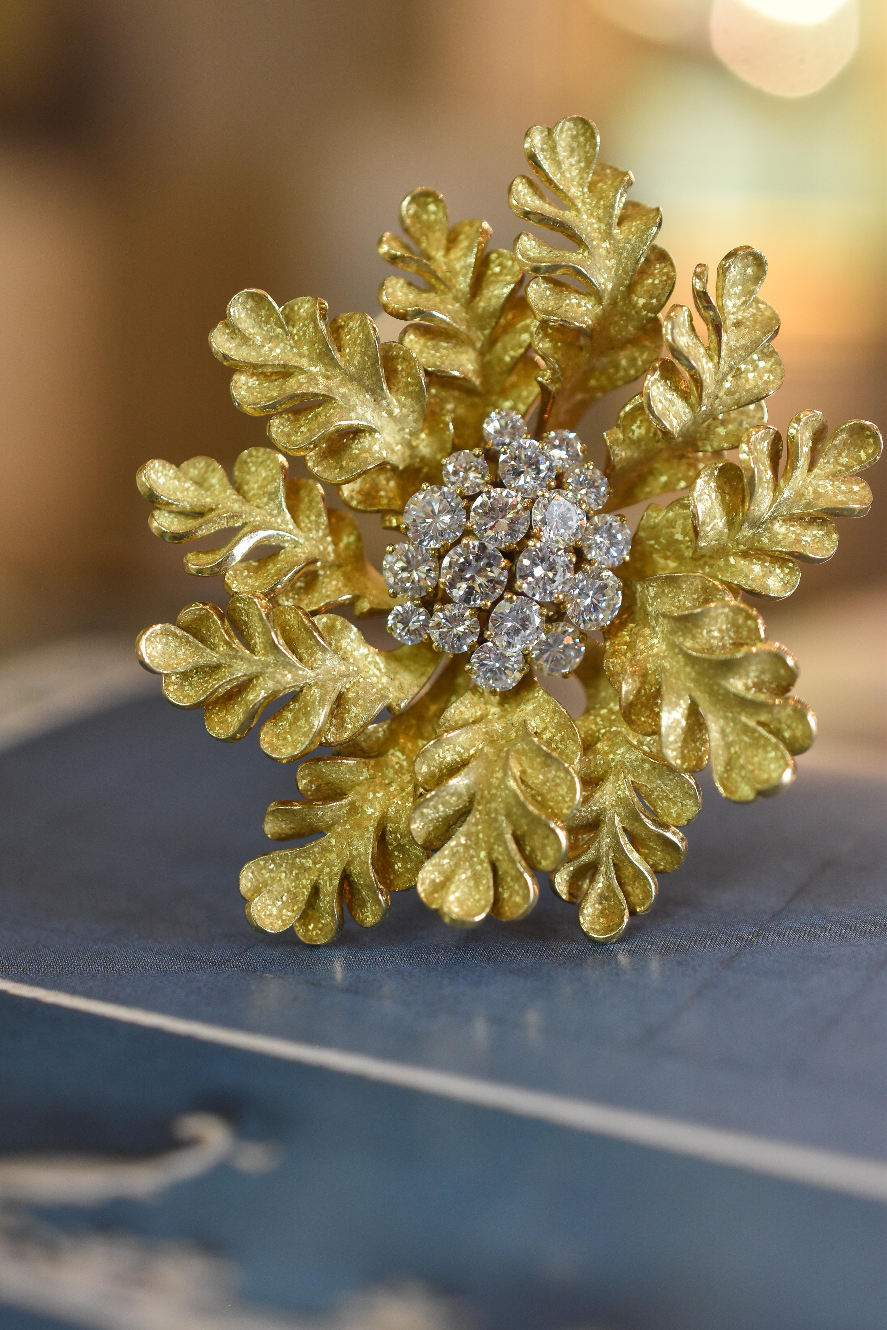 A unique and collectible Bulgari Diamond and 18k Yellow Gold Brooch of foliate design, set with approximately 3.5 carats of diamonds. Made in Italy, circa 1970.