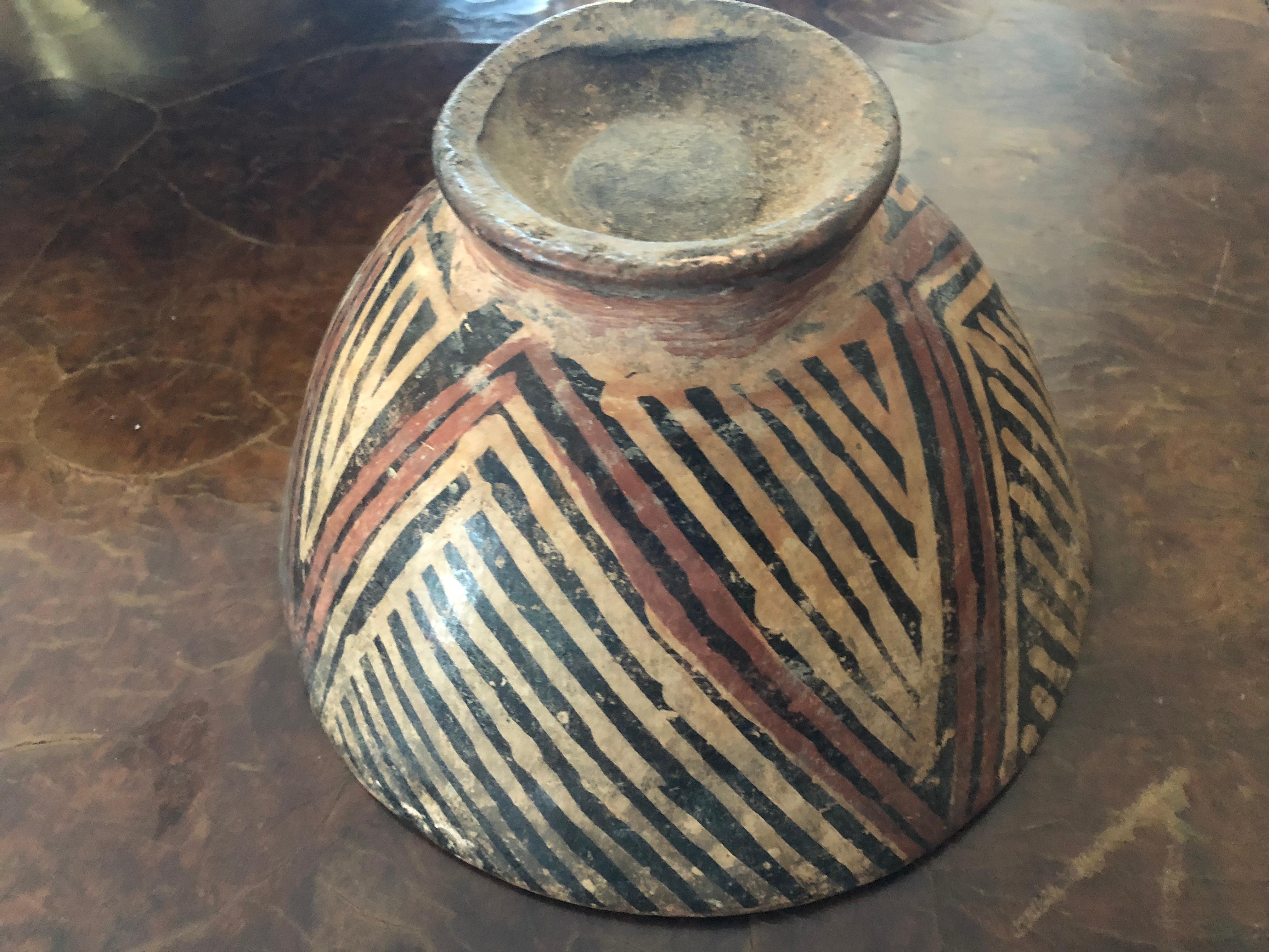 A collection of ancient siltware nile ware bowls. The design is attributed to the Naqada Period of Ancient Egypt. 

 The four vessels are from a collector who travelled in Egypt in the 1950s-1960s and may be very important. 

The repair is on