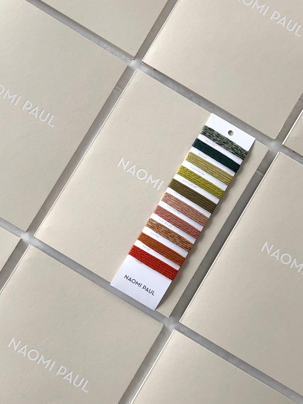Naomi Paul lighting collection book and full color collection swatch card.