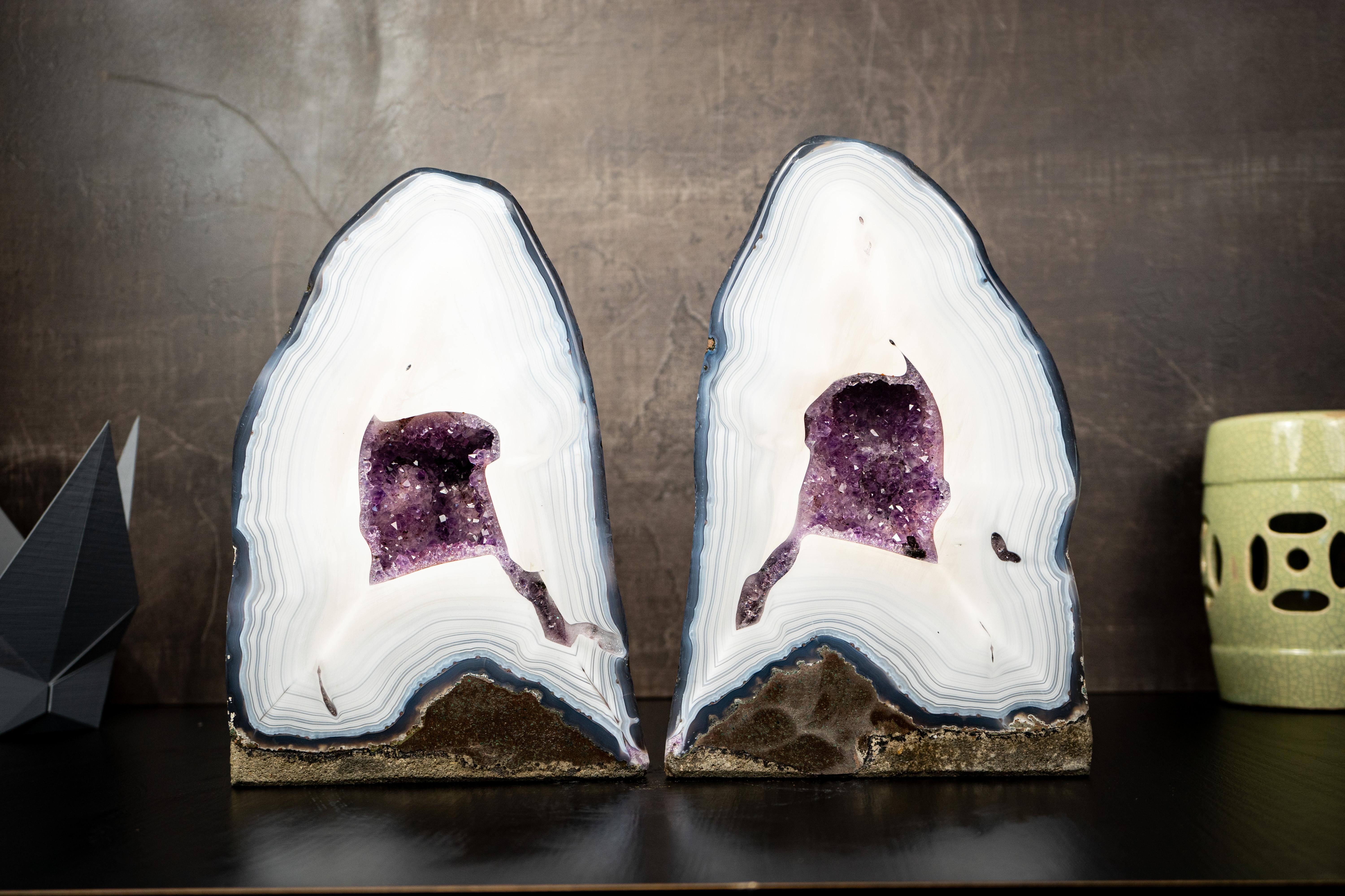 A Collector’s Pair of Agate Specimens: Perfect for Any Collection with Rare White Agate Laces and Purple Amethyst Interiors

▫️ Description

Brazil ranks among the world’s leading agate producers, and occasionally two geodes of this caliber are