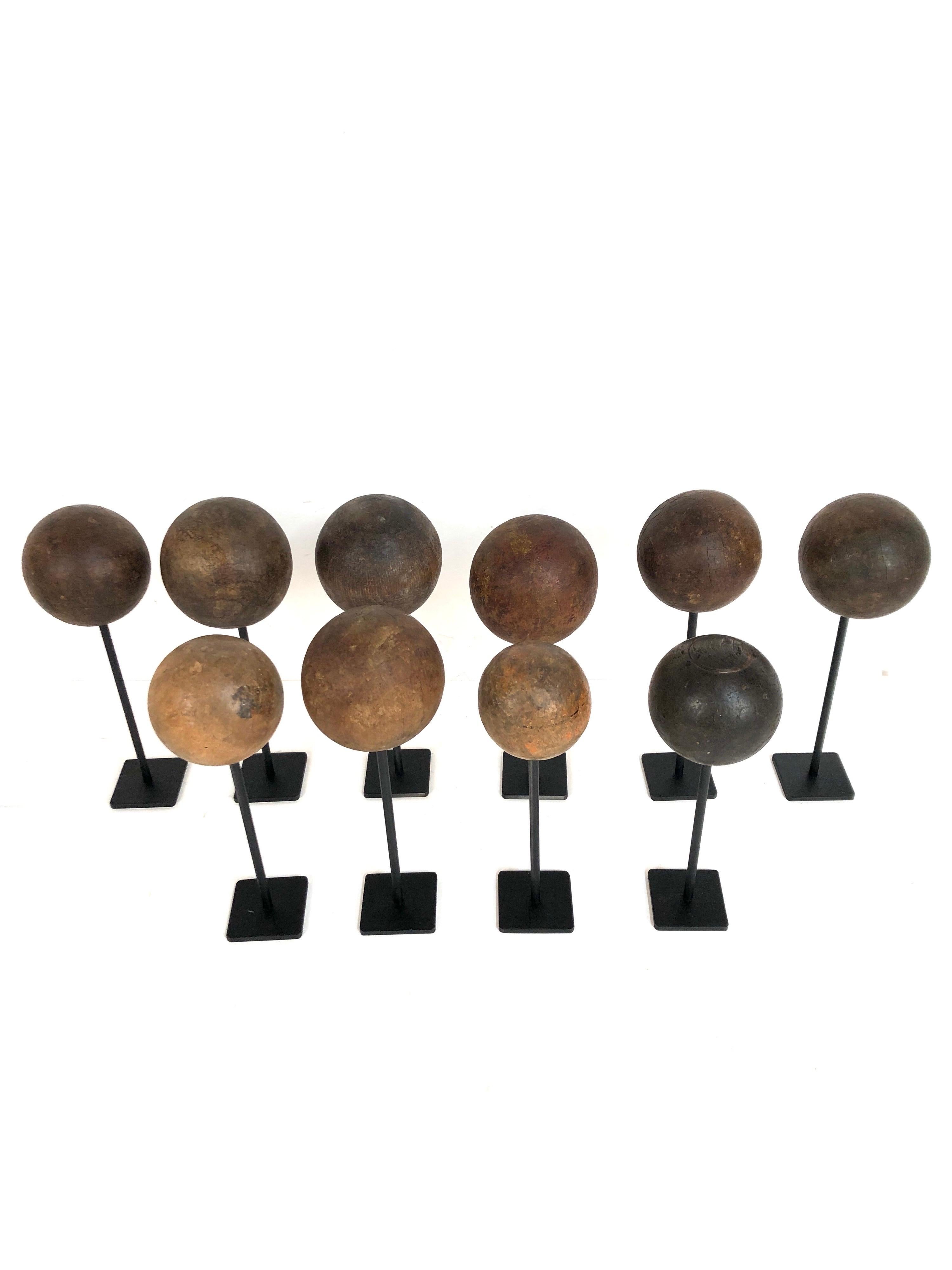 Folk Art Collection of 10 Custom Mounted Antique Wooden Balls