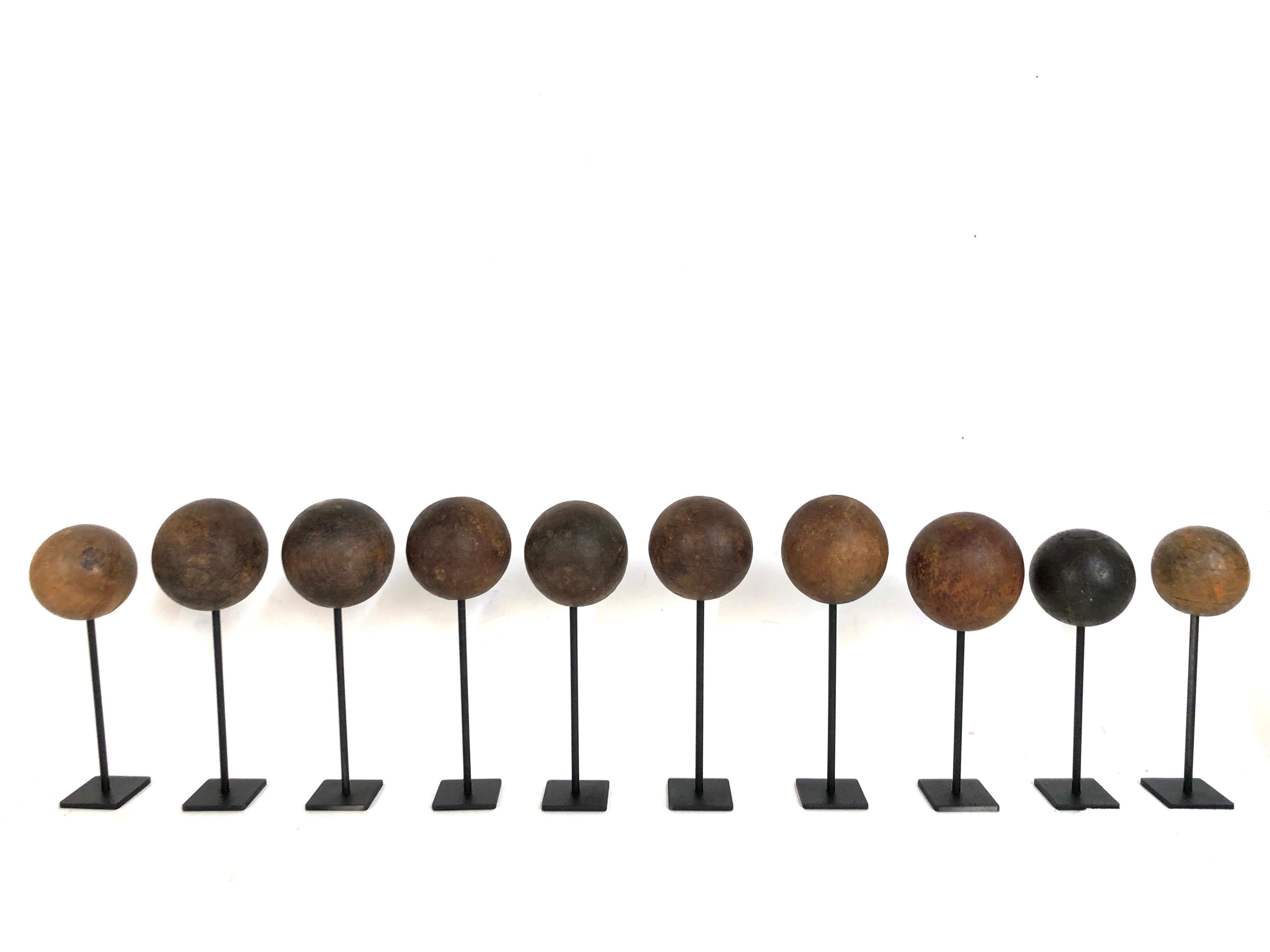 Collection of 10 Custom Mounted Antique Wooden Balls In Good Condition In Stamford, CT