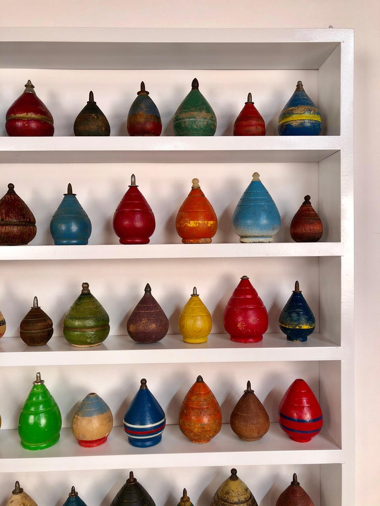  Collection  of 100 Antique Spinning  Tops  in a Custom Shadow 