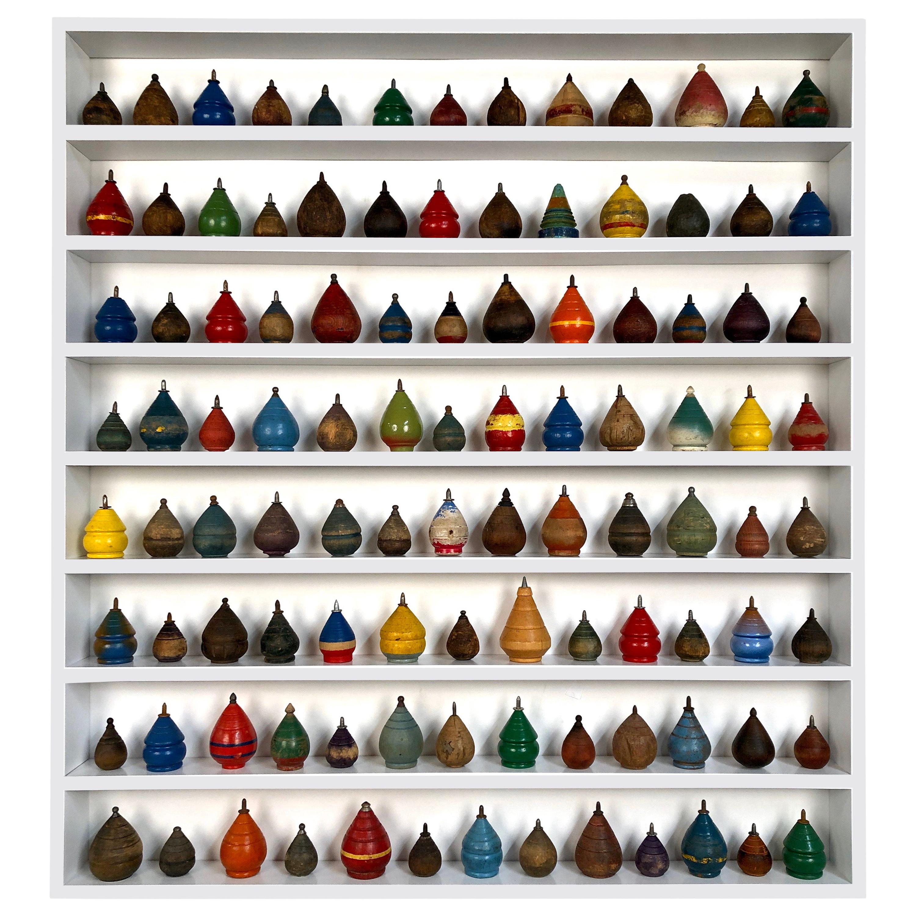 Collection of 104 Antique Wooden Spinning Tops in a Custom Shadow Box Frame
