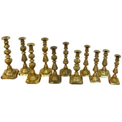 Collection of 11 Antique English Brass Candlesticks
