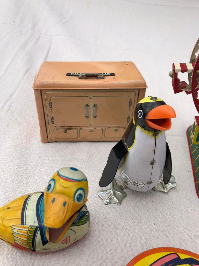 Collection of 12 Vintage Tin lithograph Toys For Sale at 1stDibs