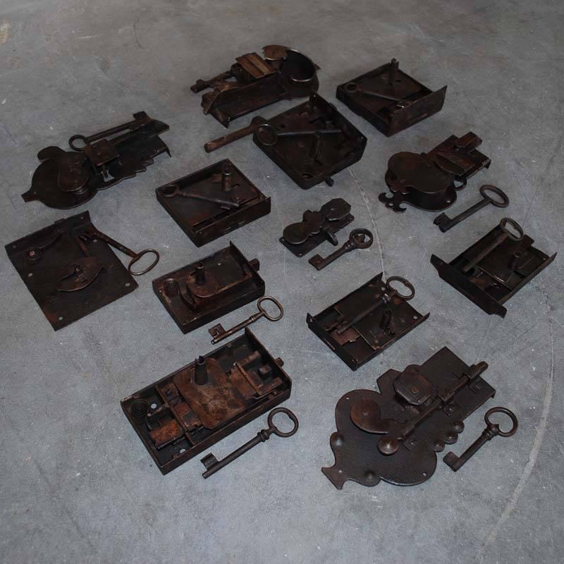 These 13 wrought iron locks are all antique locks forged by a blacksmith.
All locks have been carefully checked and a fresh wax coat was applied to make the locks ready to use.
The locks all originate in Germany and date from the early 17th