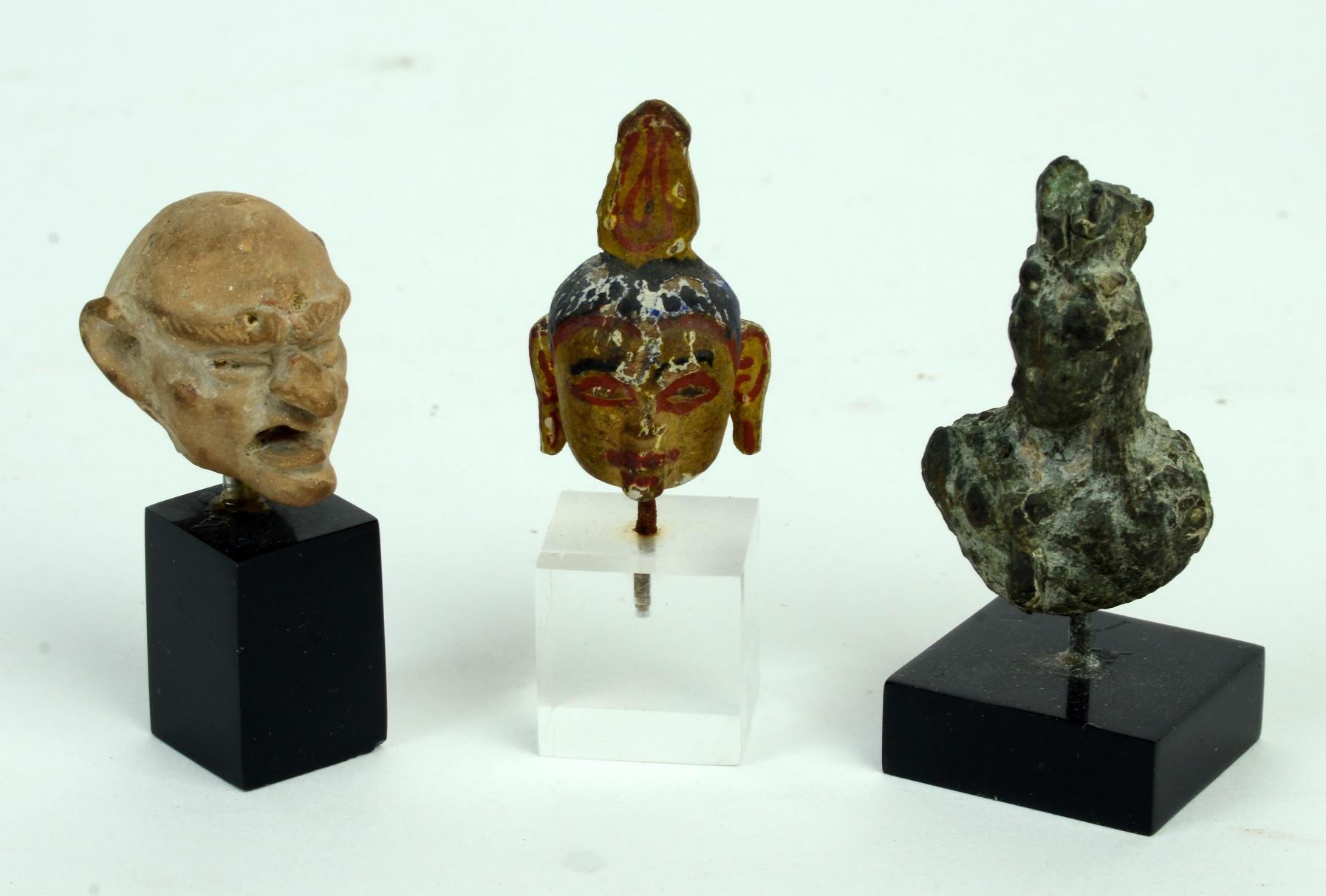 Carved Collection of 13 Miniature Heads For Sale