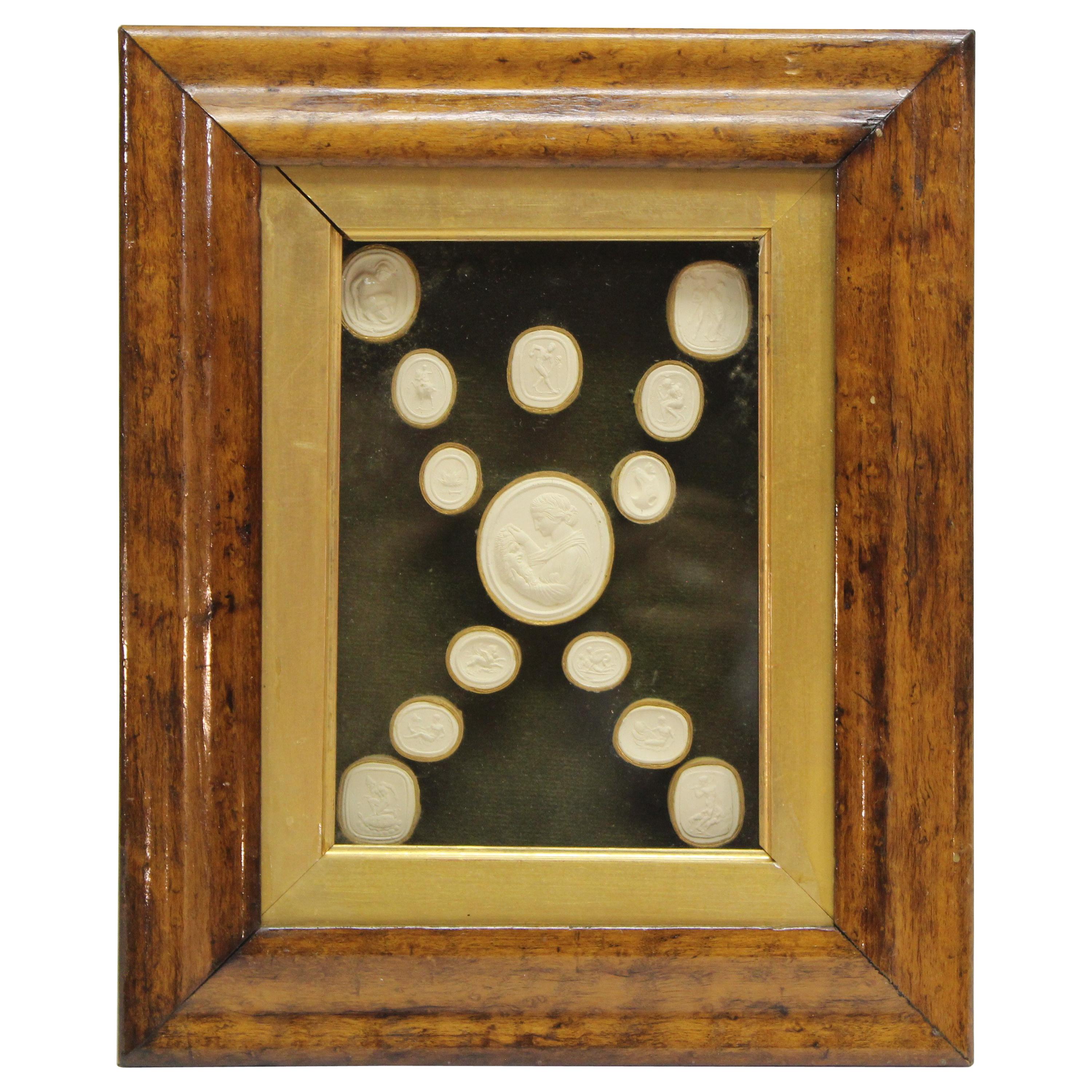 Collection of 14 Grand Tour Intaglios in Original Fruitwood Frame