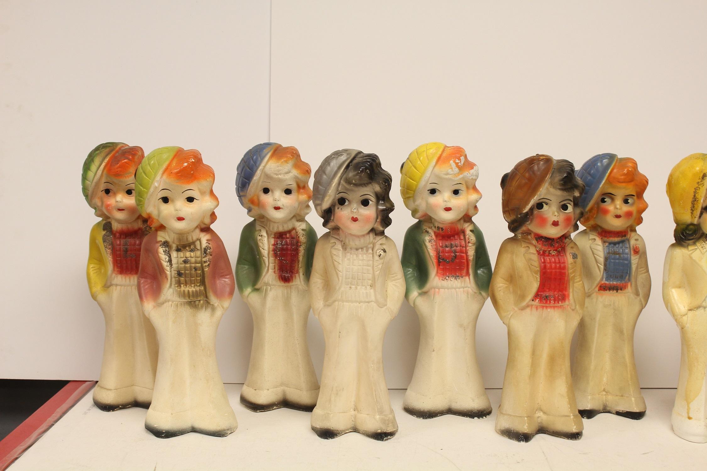 Collection of 14 vintage carnival chalk figurine prizes.