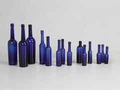 Collection of '14' Cobalt Blue caster Oil Hand Blown Bottles Made in 1800s