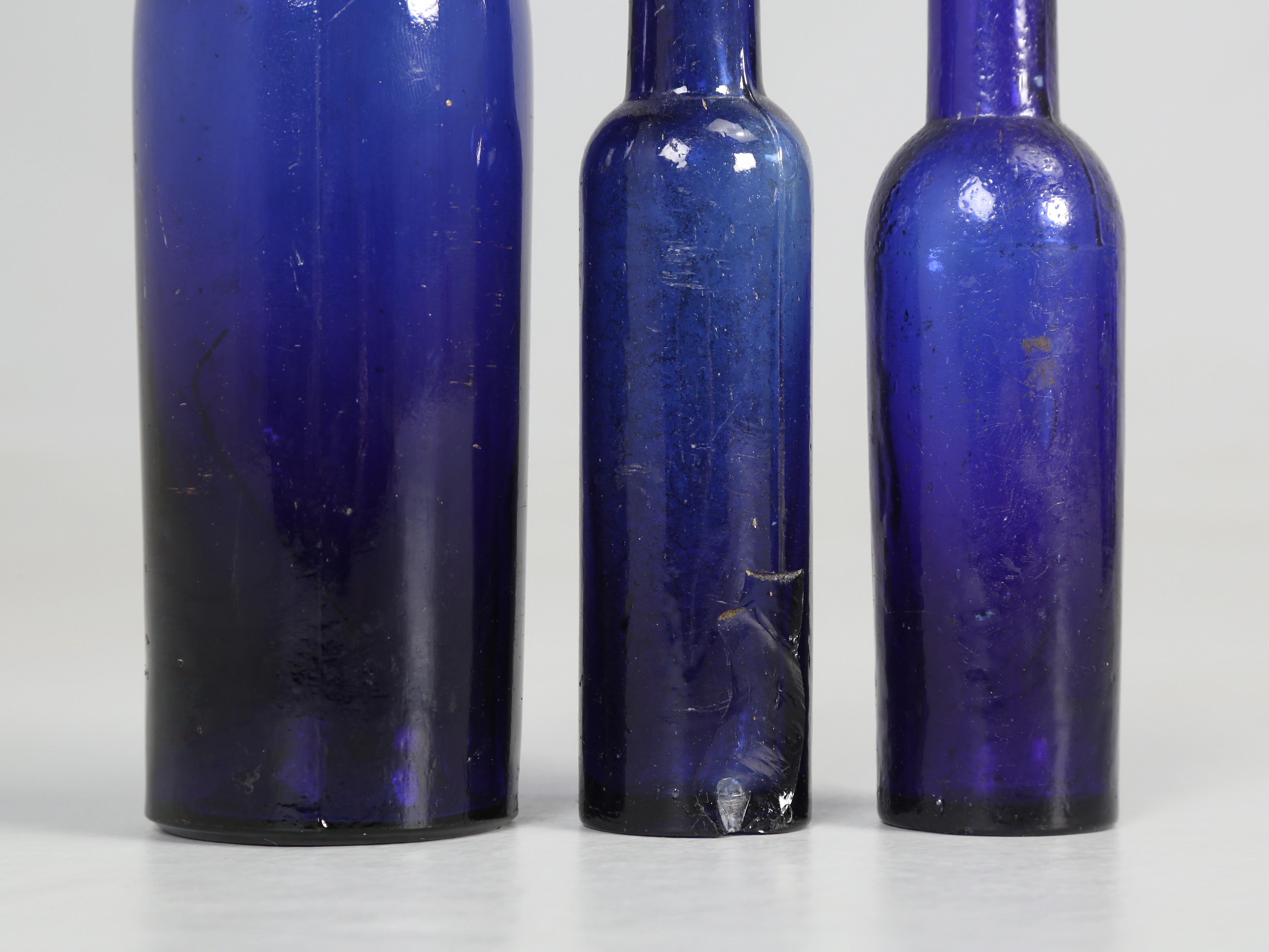 Collection of '15' Cobalt Blue caster Oil Hand Blown Bottles Made in 1800s For Sale 3