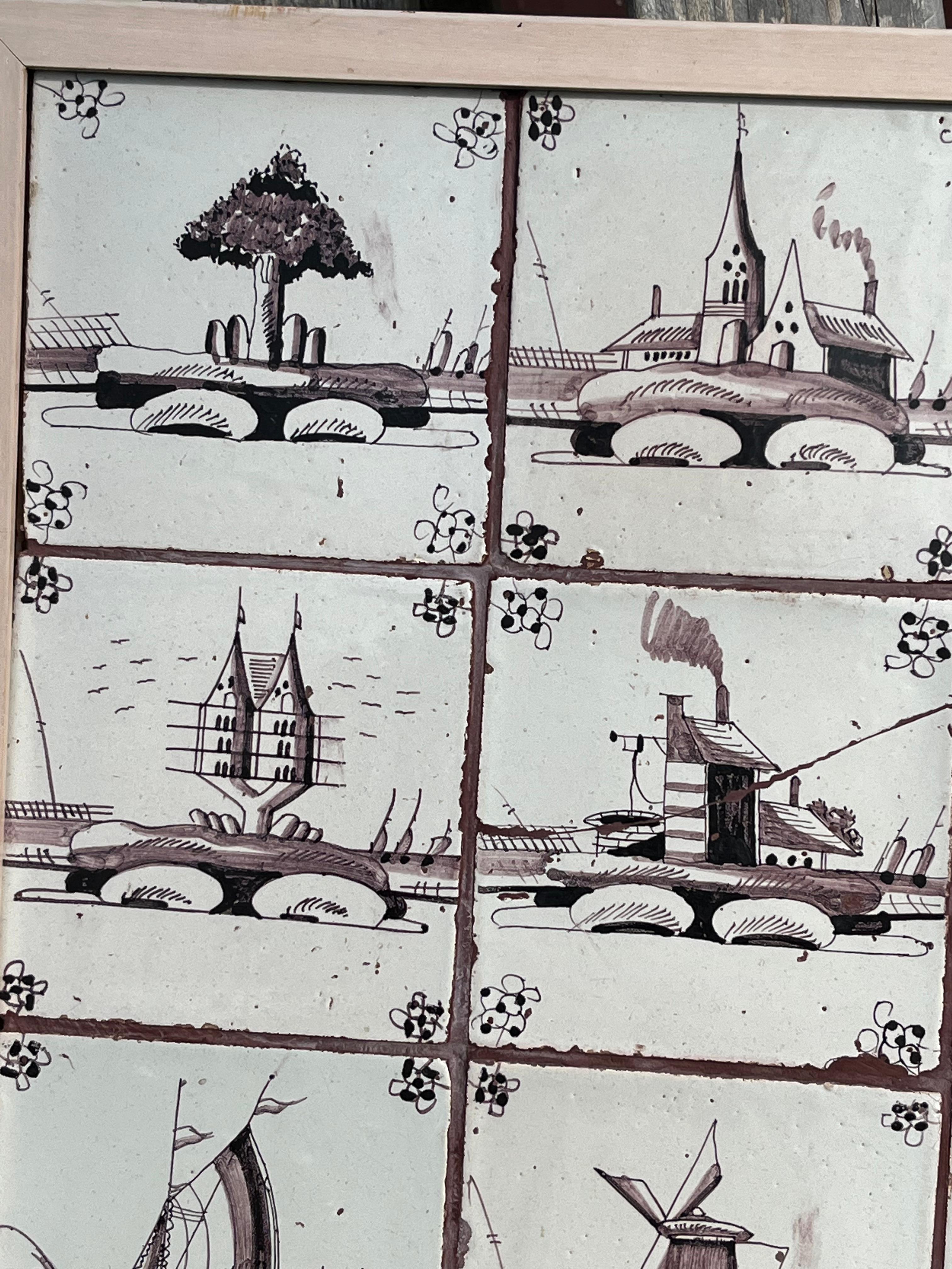Collection of 16 Delft Tiles Mounted in Frame 1