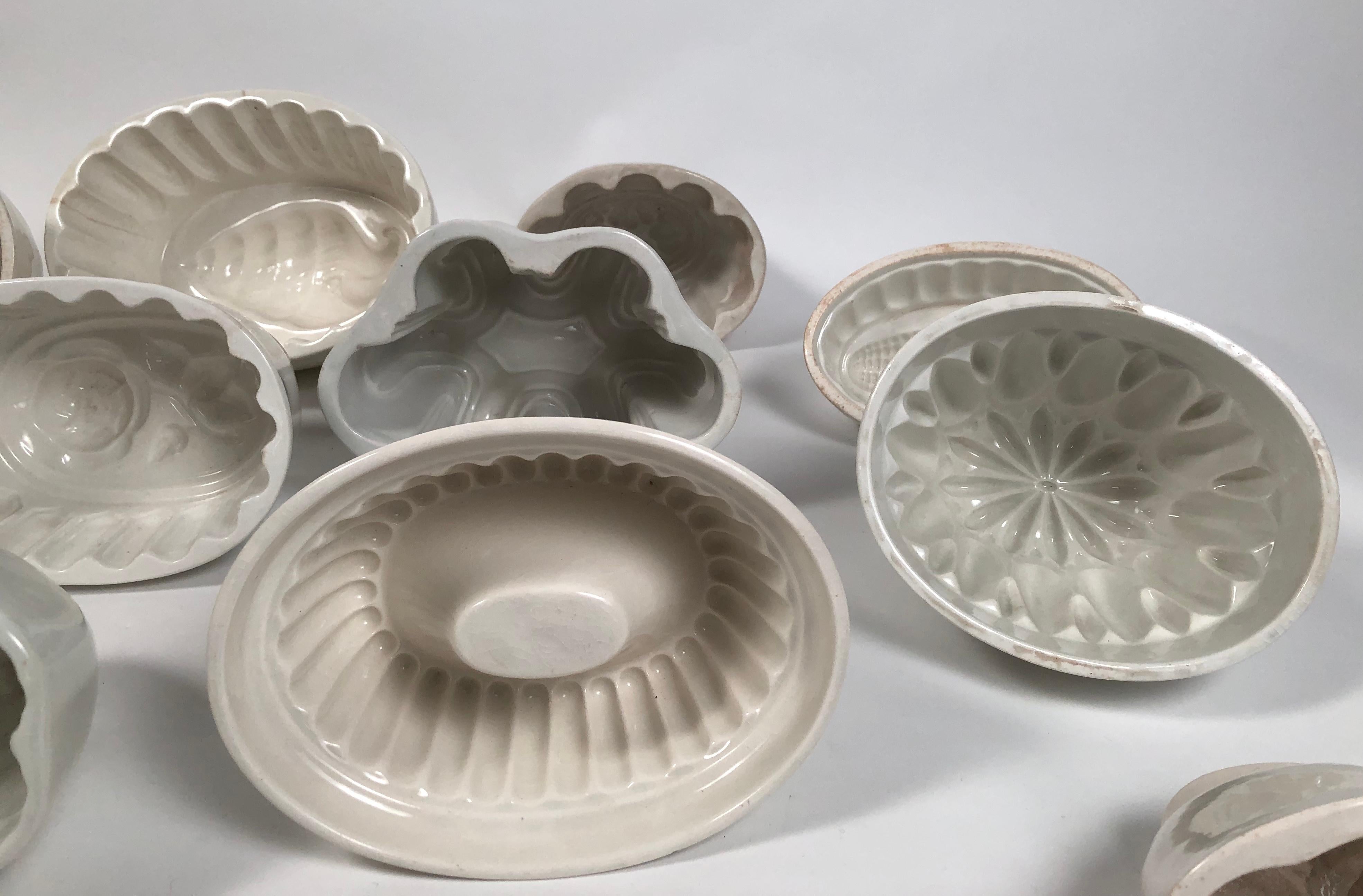 Earthenware Collection of 17 English White Ironstone Pudding Molds