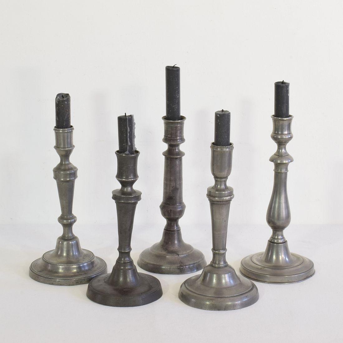 Amazing collection of five pewter candlesticks. They are all different and unique,
France, circa 1750-1850.
Weathered, dented and small losses but these imperfections help authenticate these items as they were utilitarian type pieces
Measures: H: