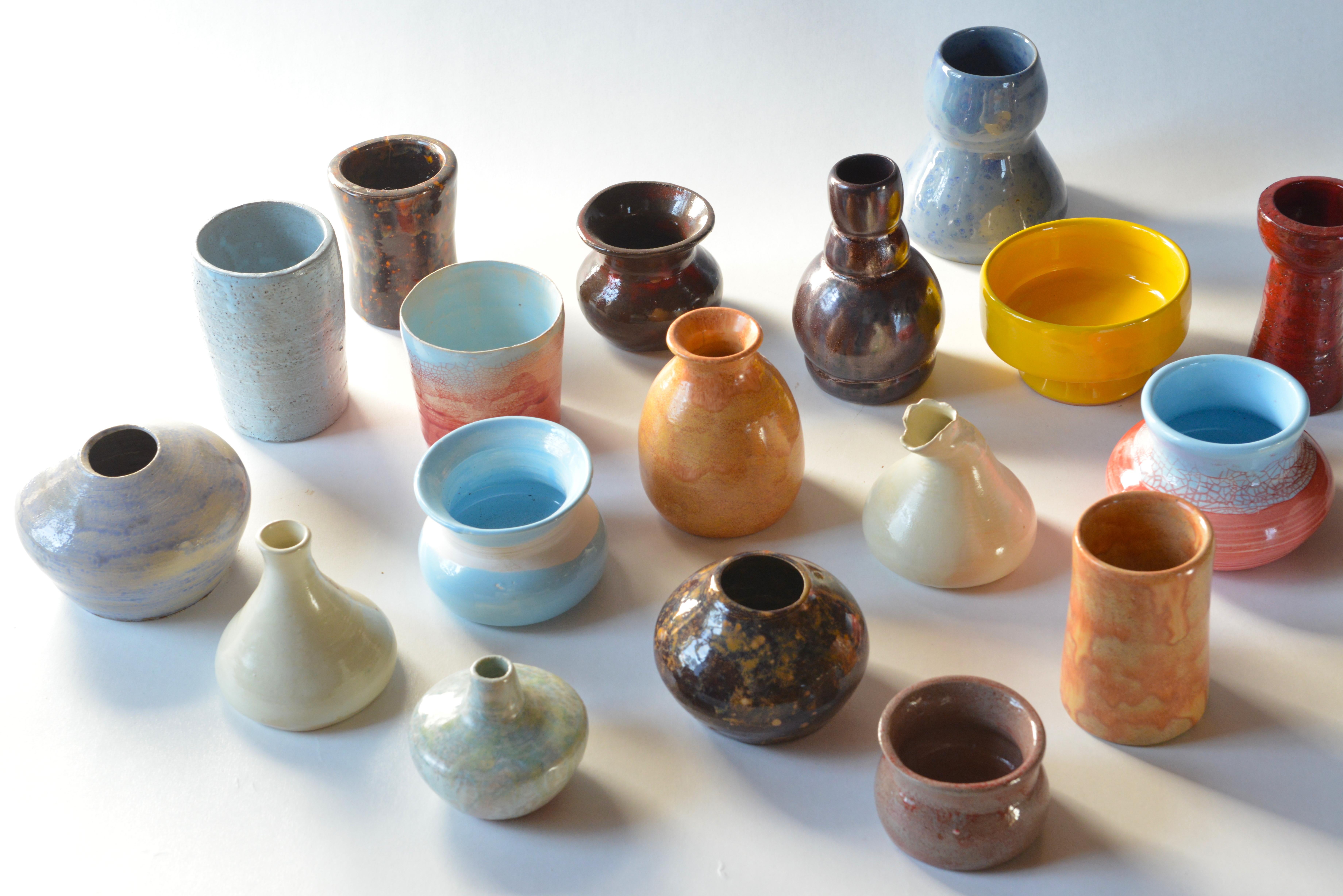 Tis lot of 19 miniature ceramic vintage vases / pots was made by a local artist in Bruges, Belgium 20 years ago. Pale blues, apricot, warm white, deep red, sunny yellow, coral and browns all go very well together.
