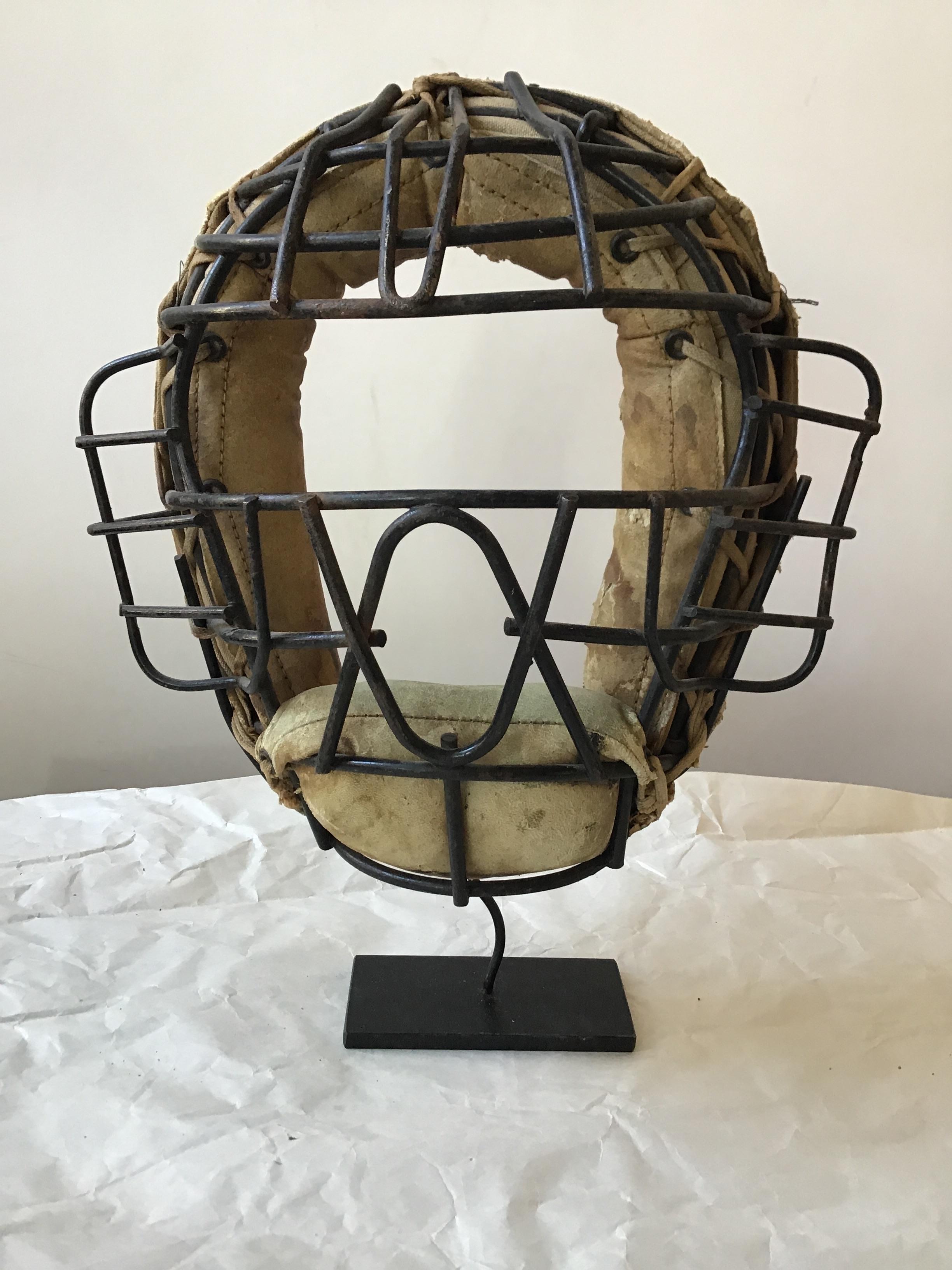 Mid-20th Century Collection Of 8  Baseball Gloves And Catchers Masks From The 1940s