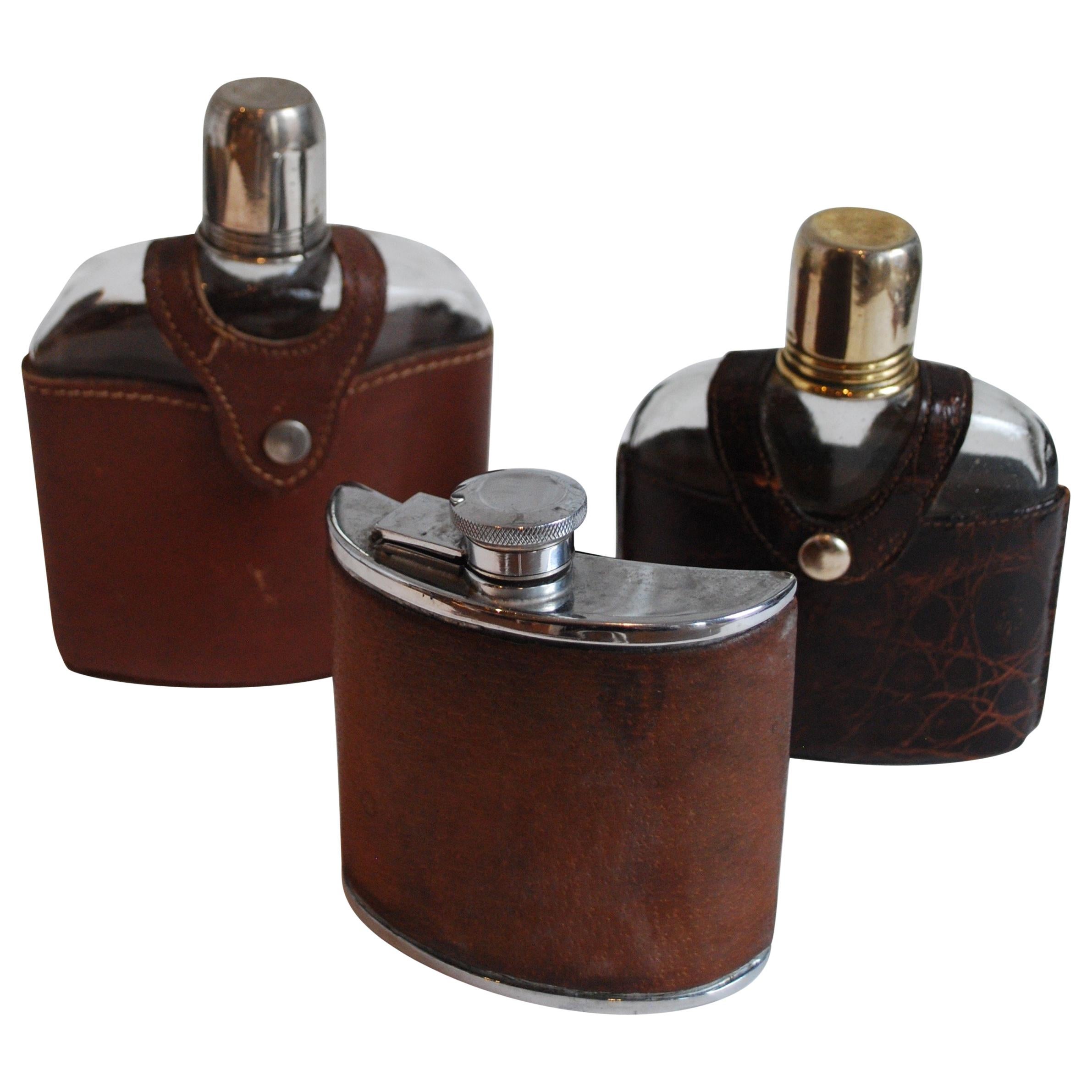Collection of 19th and 20th Century English Leather and Croc Flasks