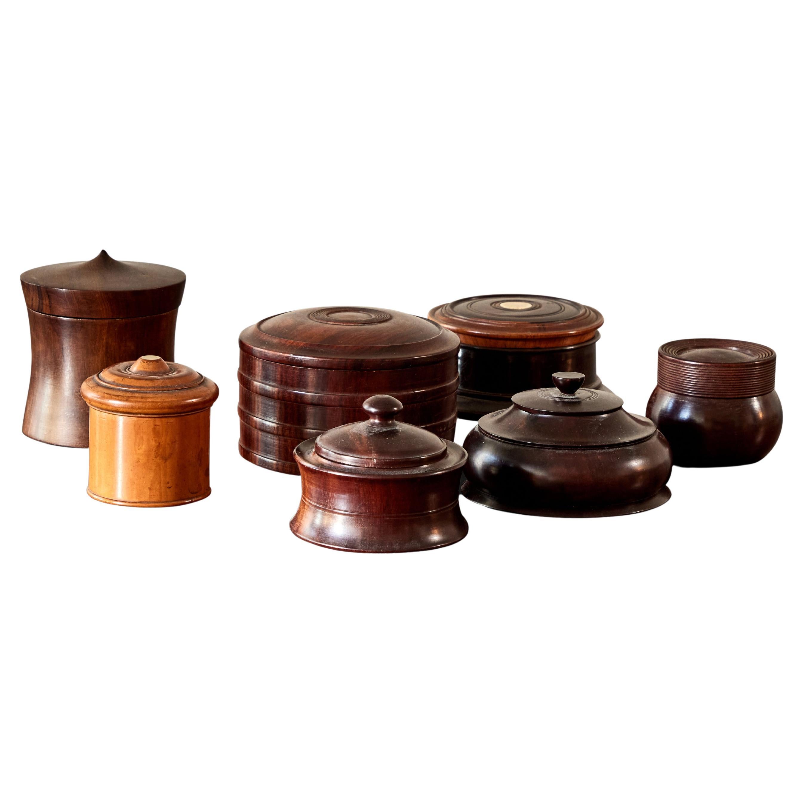 Collection of five spherical wooden boxes from late 19th-century. The beautiful variations in tone, beveling and scale make this a unique collection to display altogether, though due to the exceptional quality of each box individually, would also