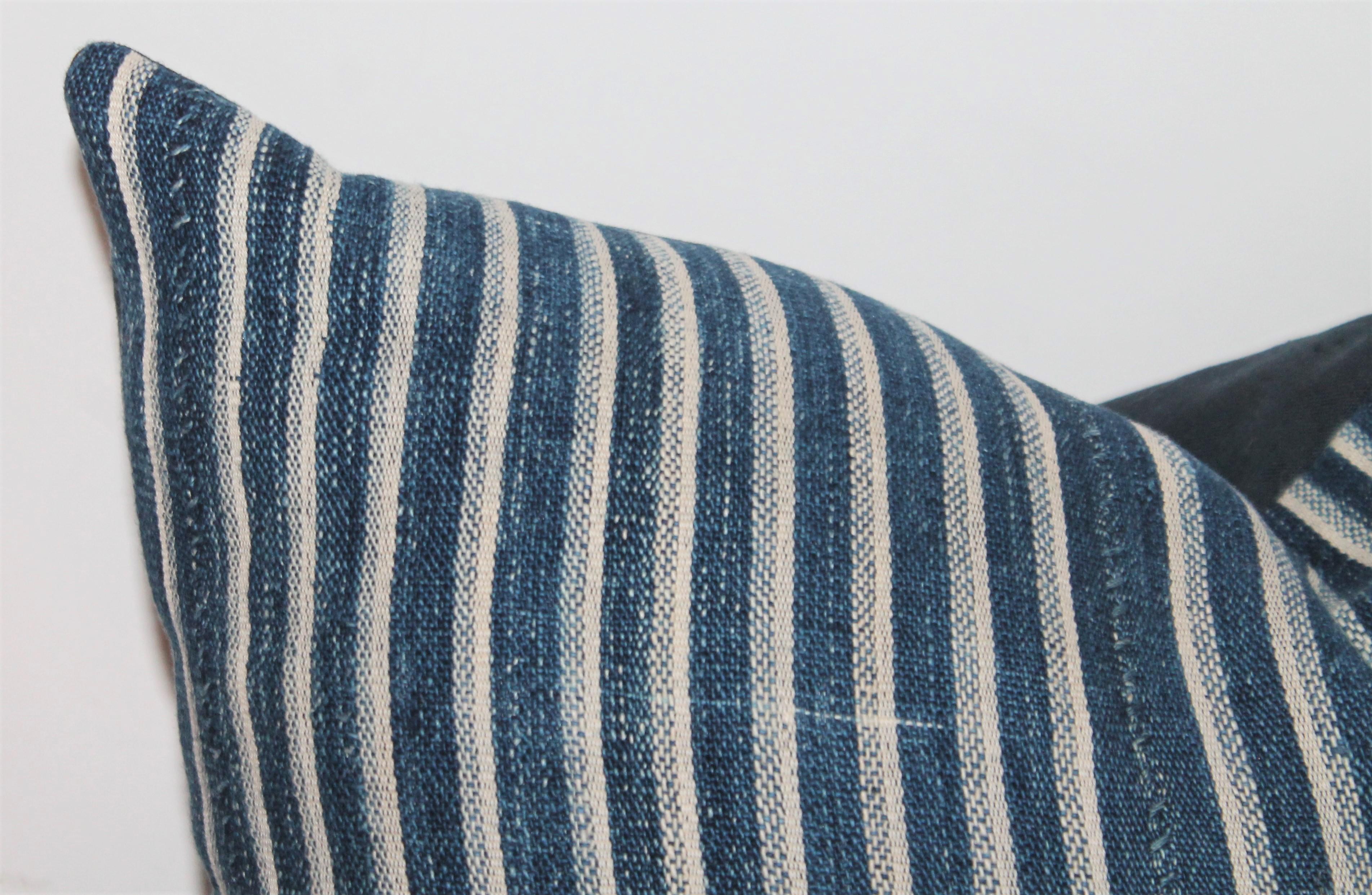American Collection of 19th Century Ticking Pillows-Faded Indigo Stripes For Sale